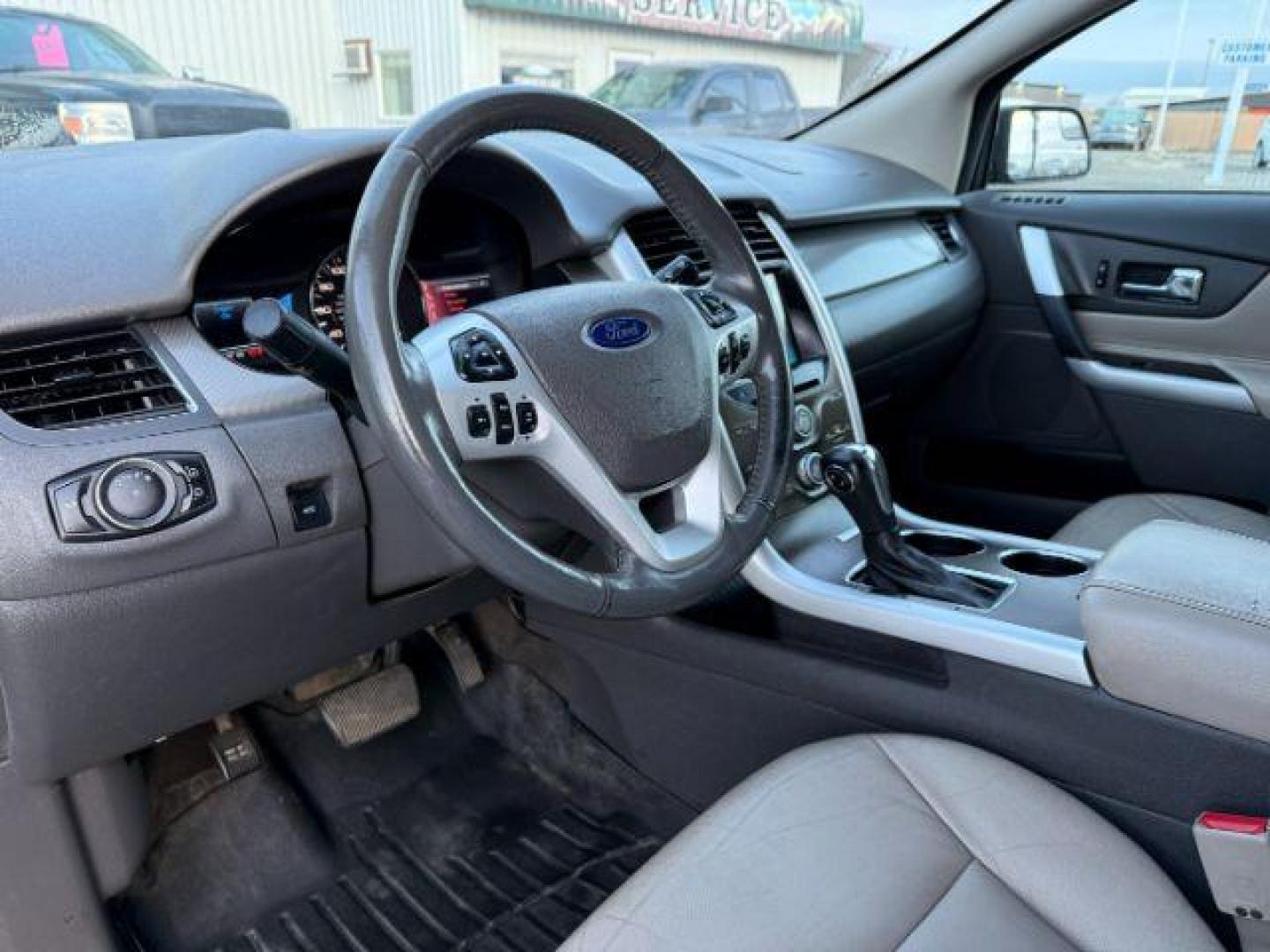 2013 GREEN /Charcoal Black Ford Edge (2FMDK4JC6DB) with an 35L V-6 DOHC engine, Automatic transmission, located at 1175 N Woodruff Ave, Idaho Falls, ID, 83401, 43.506901, -111.999657 - At Timberline Auto, finding a great deal on your next vehicle is always easy! Our experienced sales staff's goal is to help find you the right vehicle at the right price! Our knowledgeable finance department has options for almost any credit score. We offer extended service contract options to prote - Photo#41