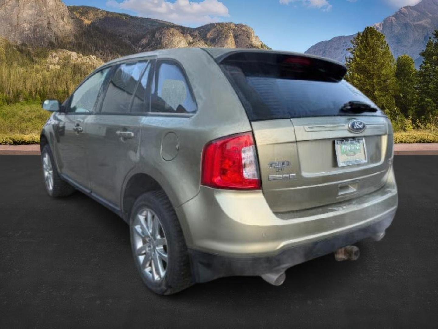 2013 GREEN /Charcoal Black Ford Edge (2FMDK4JC6DB) with an 35L V-6 DOHC engine, Automatic transmission, located at 1175 N Woodruff Ave, Idaho Falls, ID, 83401, 43.506901, -111.999657 - At Timberline Auto, finding a great deal on your next vehicle is always easy! Our experienced sales staff's goal is to help find you the right vehicle at the right price! Our knowledgeable finance department has options for almost any credit score. We offer extended service contract options to prote - Photo#2