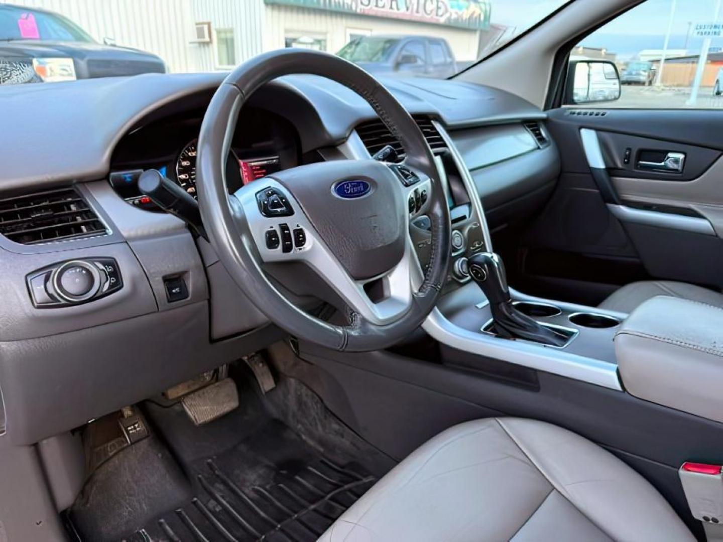 2013 GREEN /Charcoal Black Ford Edge (2FMDK4JC6DB) with an 35L V-6 DOHC engine, Automatic transmission, located at 1175 N Woodruff Ave, Idaho Falls, ID, 83401, 43.506901, -111.999657 - At Timberline Auto, finding a great deal on your next vehicle is always easy! Our experienced sales staff's goal is to help find you the right vehicle at the right price! Our knowledgeable finance department has options for almost any credit score. We offer extended service contract options to prote - Photo#16