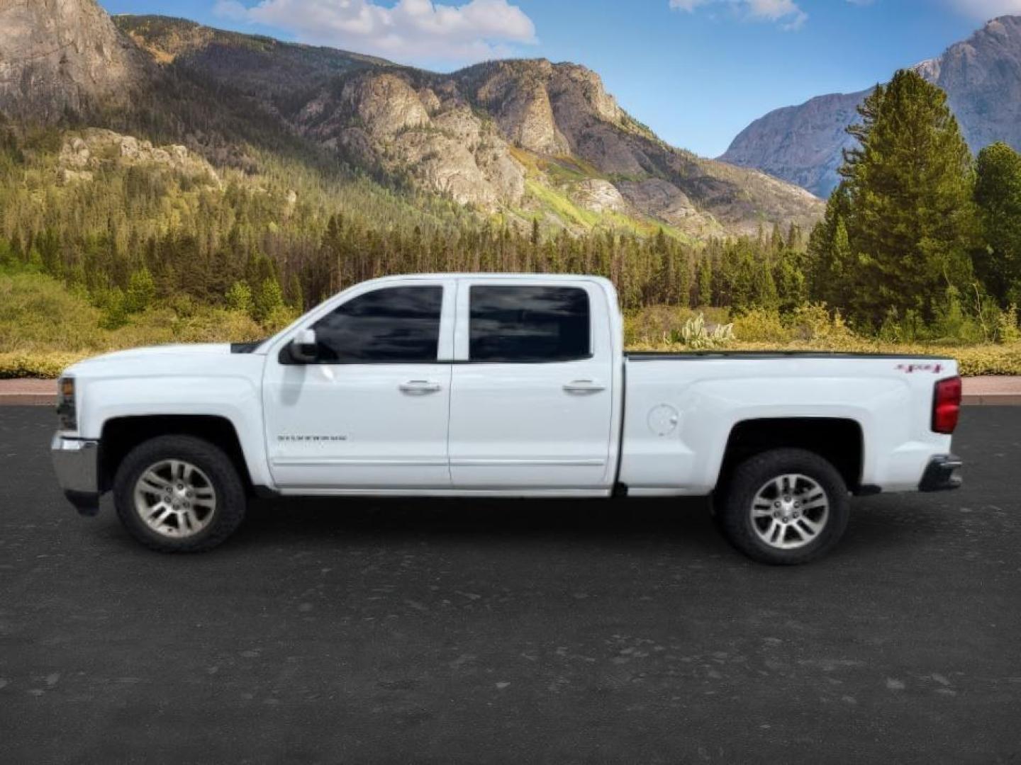 2017 WHITE /Jet Black Chevrolet Silverado 1500 (1GCUKREC7HF) with an EcoTec3 53L V-8 gasoline direct injection engine, Automatic transmission, located at 1175 N Woodruff Ave, Idaho Falls, ID, 83401, 43.506901, -111.999657 - Powered by an EcoTec3 5.3L V8 gasoline direct injection engine paired with an automatic transmission. 4x4 half-ton pickup built for towing, hauling, and everyday durability with strong V8 performance. Features include touchscreen infotainment, Bluetooth connectivity, rearview camera, cruise control,- Photo#1