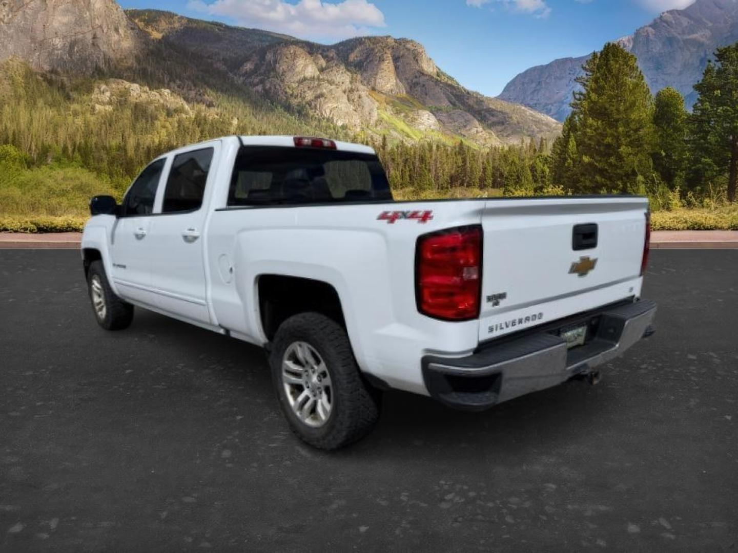 2017 WHITE /Jet Black Chevrolet Silverado 1500 (1GCUKREC7HF) with an EcoTec3 53L V-8 gasoline direct injection engine, Automatic transmission, located at 1175 N Woodruff Ave, Idaho Falls, ID, 83401, 43.506901, -111.999657 - Powered by an EcoTec3 5.3L V8 gasoline direct injection engine paired with an automatic transmission. 4x4 half-ton pickup built for towing, hauling, and everyday durability with strong V8 performance. Features include touchscreen infotainment, Bluetooth connectivity, rearview camera, cruise control,- Photo#2