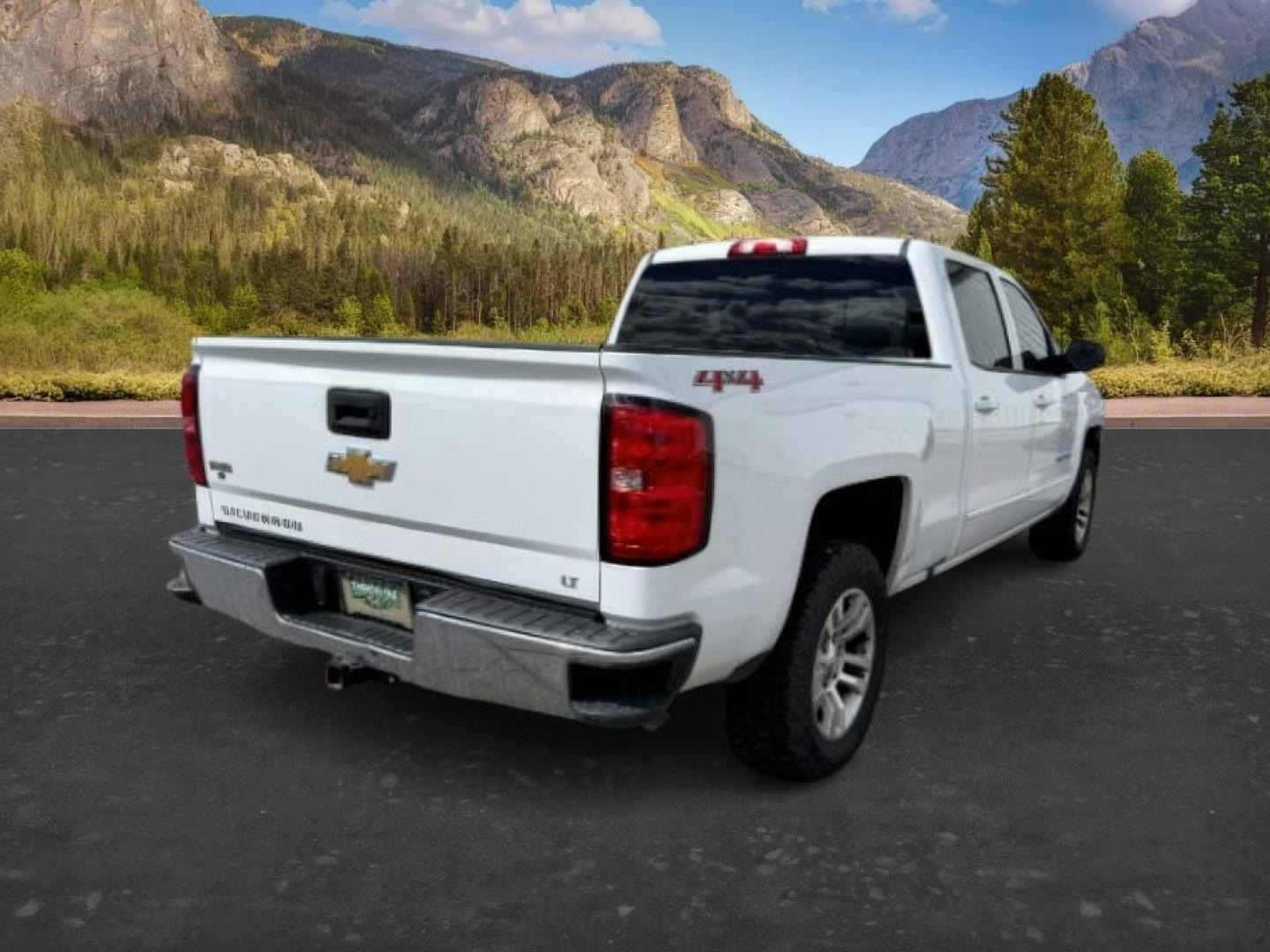 2017 WHITE /Jet Black Chevrolet Silverado 1500 (1GCUKREC7HF) with an EcoTec3 53L V-8 gasoline direct injection engine, Automatic transmission, located at 1175 N Woodruff Ave, Idaho Falls, ID, 83401, 43.506901, -111.999657 - Powered by an EcoTec3 5.3L V8 gasoline direct injection engine paired with an automatic transmission. 4x4 half-ton pickup built for towing, hauling, and everyday durability with strong V8 performance. Features include touchscreen infotainment, Bluetooth connectivity, rearview camera, cruise control,- Photo#6