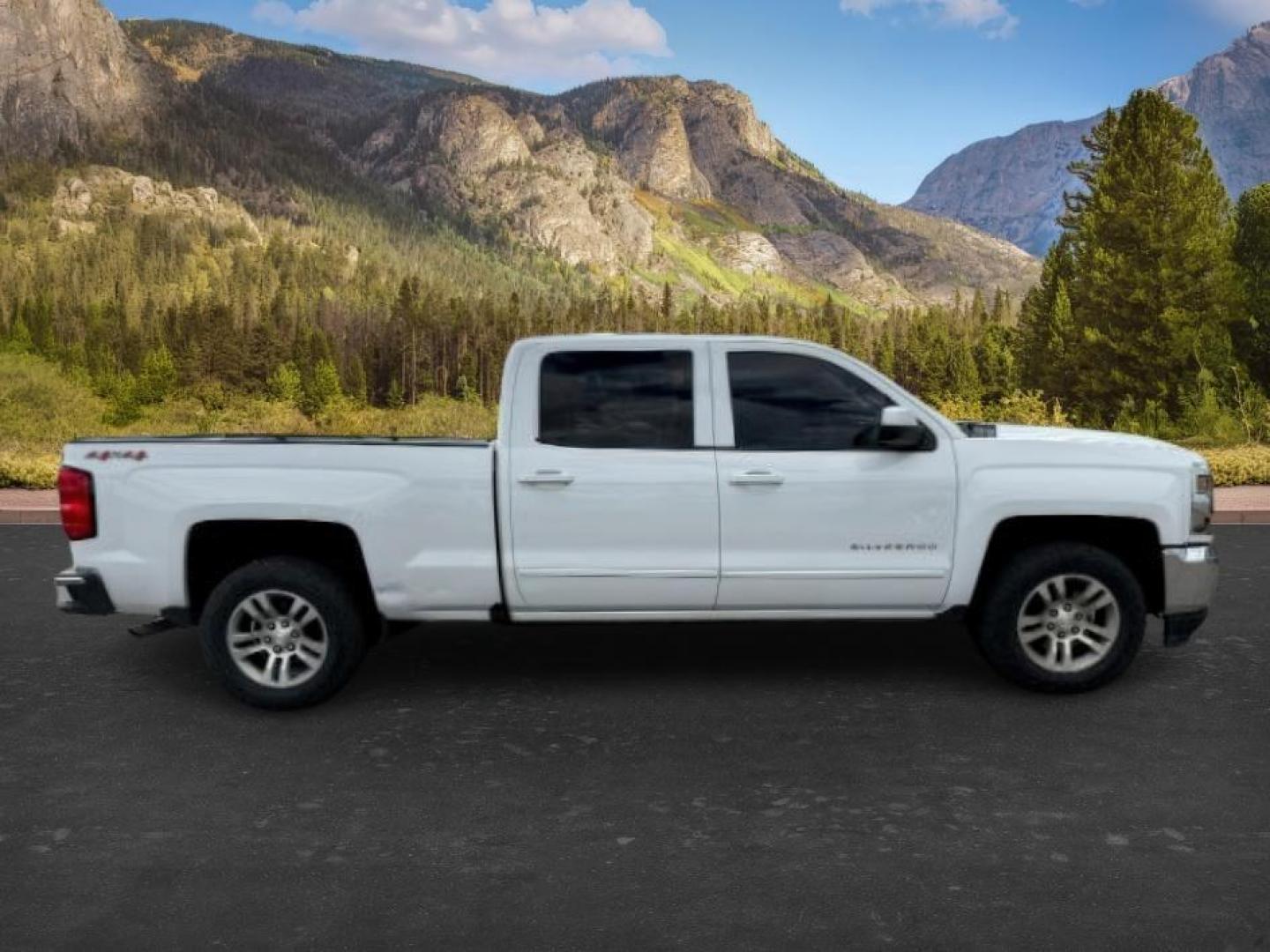 2017 WHITE /Jet Black Chevrolet Silverado 1500 (1GCUKREC7HF) with an EcoTec3 53L V-8 gasoline direct injection engine, Automatic transmission, located at 1175 N Woodruff Ave, Idaho Falls, ID, 83401, 43.506901, -111.999657 - Powered by an EcoTec3 5.3L V8 gasoline direct injection engine paired with an automatic transmission. 4x4 half-ton pickup built for towing, hauling, and everyday durability with strong V8 performance. Features include touchscreen infotainment, Bluetooth connectivity, rearview camera, cruise control,- Photo#7