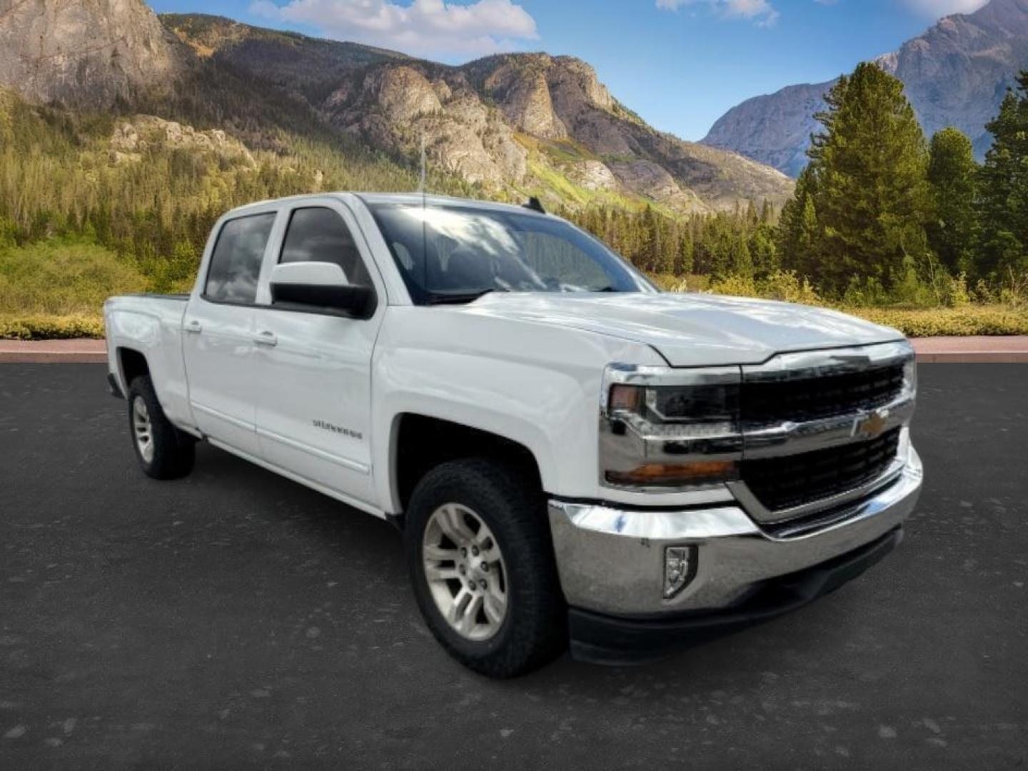2017 WHITE /Jet Black Chevrolet Silverado 1500 (1GCUKREC7HF) with an EcoTec3 53L V-8 gasoline direct injection engine, Automatic transmission, located at 1175 N Woodruff Ave, Idaho Falls, ID, 83401, 43.506901, -111.999657 - Powered by an EcoTec3 5.3L V8 gasoline direct injection engine paired with an automatic transmission. 4x4 half-ton pickup built for towing, hauling, and everyday durability with strong V8 performance. Features include touchscreen infotainment, Bluetooth connectivity, rearview camera, cruise control,- Photo#8