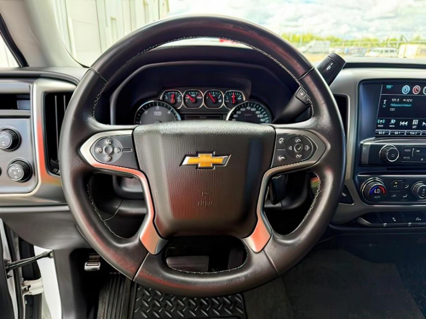 2017 WHITE /Jet Black Chevrolet Silverado 1500 (1GCUKREC7HF) with an EcoTec3 53L V-8 gasoline direct injection engine, Automatic transmission, located at 1175 N Woodruff Ave, Idaho Falls, ID, 83401, 43.506901, -111.999657 - Powered by an EcoTec3 5.3L V8 gasoline direct injection engine paired with an automatic transmission. 4x4 half-ton pickup built for towing, hauling, and everyday durability with strong V8 performance. Features include touchscreen infotainment, Bluetooth connectivity, rearview camera, cruise control,- Photo#14