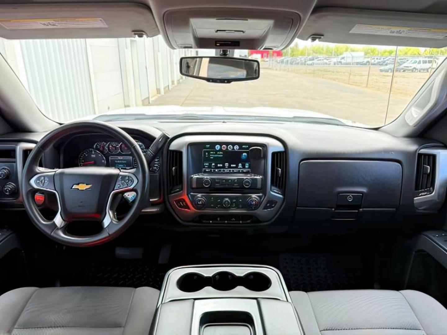 2017 WHITE /Jet Black Chevrolet Silverado 1500 (1GCUKREC7HF) with an EcoTec3 53L V-8 gasoline direct injection engine, Automatic transmission, located at 1175 N Woodruff Ave, Idaho Falls, ID, 83401, 43.506901, -111.999657 - Powered by an EcoTec3 5.3L V8 gasoline direct injection engine paired with an automatic transmission. 4x4 half-ton pickup built for towing, hauling, and everyday durability with strong V8 performance. Features include touchscreen infotainment, Bluetooth connectivity, rearview camera, cruise control,- Photo#23