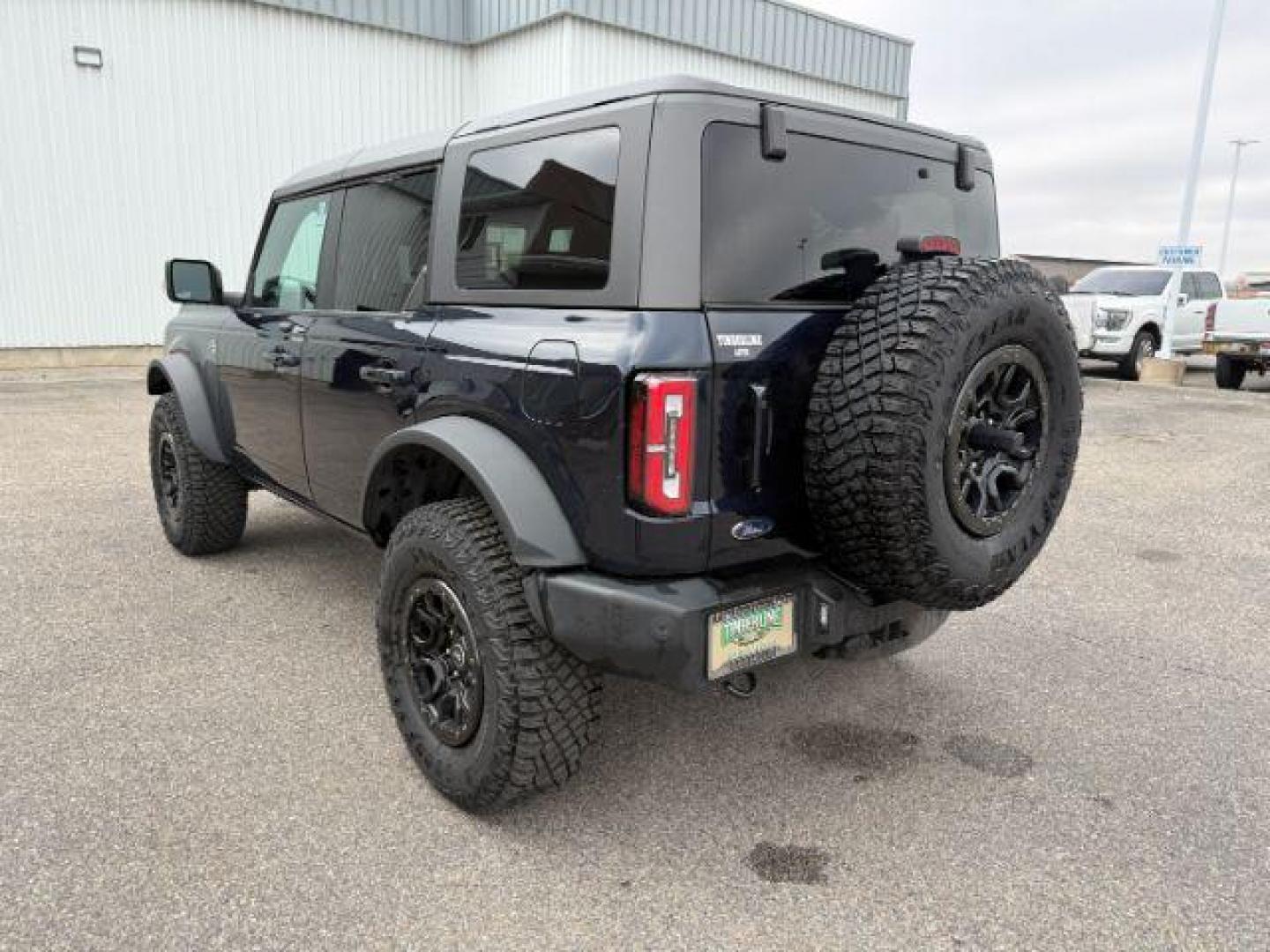 2021 BLUE /Medium Sandstone w/Black Onyx Ford Bronco (1FMEE5DP7ML) with an EcoBoost 27L V-6 portdirect injection engine, Automatic transmission, located at 1175 N Woodruff Ave, Idaho Falls, ID, 83401, 43.506901, -111.999657 - At Timberline Auto, finding a great deal on your next vehicle is always easy! Our experienced sales staff's goal is to help find you the right vehicle at the right price! Our knowledgeable finance department has options for almost any credit score. We offer extended service contract options to prote - Photo#2