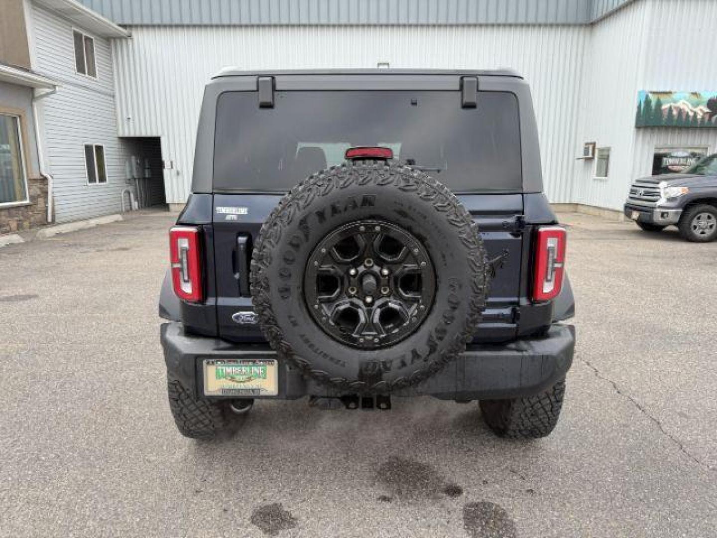 2021 BLUE /Medium Sandstone w/Black Onyx Ford Bronco (1FMEE5DP7ML) with an EcoBoost 27L V-6 portdirect injection engine, Automatic transmission, located at 1175 N Woodruff Ave, Idaho Falls, ID, 83401, 43.506901, -111.999657 - At Timberline Auto, finding a great deal on your next vehicle is always easy! Our experienced sales staff's goal is to help find you the right vehicle at the right price! Our knowledgeable finance department has options for almost any credit score. We offer extended service contract options to prote - Photo#3
