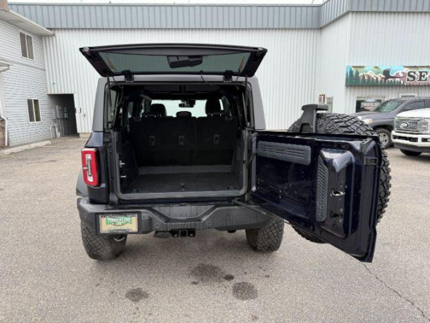 2021 BLUE /Medium Sandstone w/Black Onyx Ford Bronco (1FMEE5DP7ML) with an EcoBoost 27L V-6 portdirect injection engine, Automatic transmission, located at 1175 N Woodruff Ave, Idaho Falls, ID, 83401, 43.506901, -111.999657 - At Timberline Auto, finding a great deal on your next vehicle is always easy! Our experienced sales staff's goal is to help find you the right vehicle at the right price! Our knowledgeable finance department has options for almost any credit score. We offer extended service contract options to prote - Photo#4