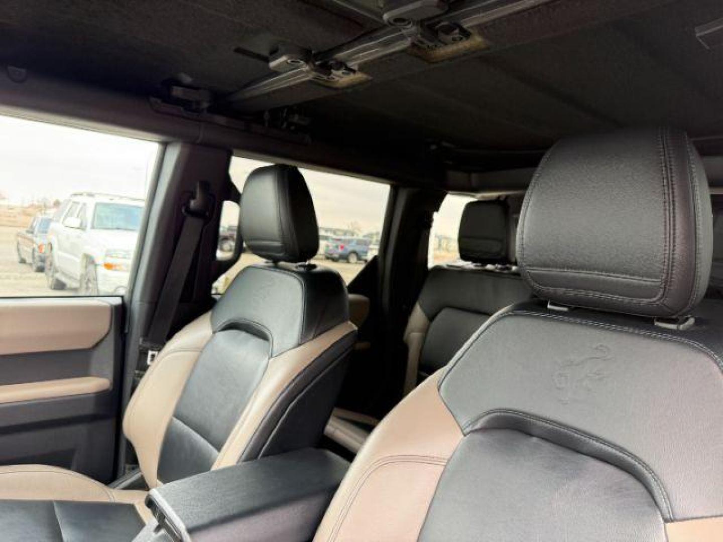 2021 BLUE /Medium Sandstone w/Black Onyx Ford Bronco (1FMEE5DP7ML) with an EcoBoost 27L V-6 portdirect injection engine, Automatic transmission, located at 1175 N Woodruff Ave, Idaho Falls, ID, 83401, 43.506901, -111.999657 - At Timberline Auto, finding a great deal on your next vehicle is always easy! Our experienced sales staff's goal is to help find you the right vehicle at the right price! Our knowledgeable finance department has options for almost any credit score. We offer extended service contract options to prote - Photo#22