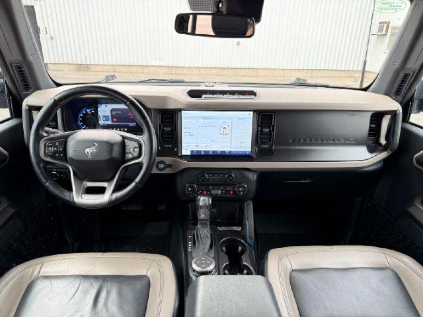 2021 BLUE /Medium Sandstone w/Black Onyx Ford Bronco (1FMEE5DP7ML) with an EcoBoost 27L V-6 portdirect injection engine, Automatic transmission, located at 1175 N Woodruff Ave, Idaho Falls, ID, 83401, 43.506901, -111.999657 - At Timberline Auto, finding a great deal on your next vehicle is always easy! Our experienced sales staff's goal is to help find you the right vehicle at the right price! Our knowledgeable finance department has options for almost any credit score. We offer extended service contract options to prote - Photo#24