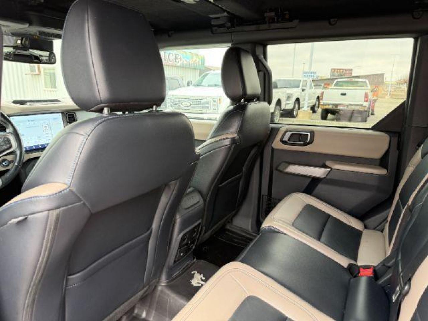 2021 BLUE /Medium Sandstone w/Black Onyx Ford Bronco (1FMEE5DP7ML) with an EcoBoost 27L V-6 portdirect injection engine, Automatic transmission, located at 1175 N Woodruff Ave, Idaho Falls, ID, 83401, 43.506901, -111.999657 - At Timberline Auto, finding a great deal on your next vehicle is always easy! Our experienced sales staff's goal is to help find you the right vehicle at the right price! Our knowledgeable finance department has options for almost any credit score. We offer extended service contract options to prote - Photo#25