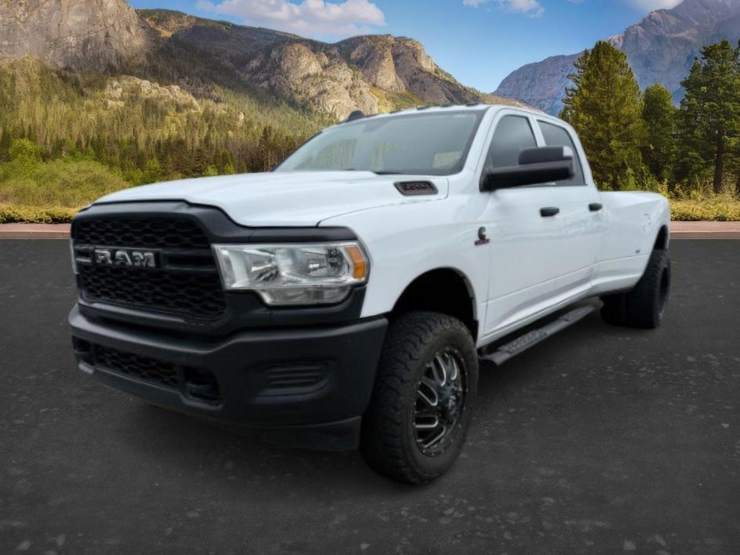 2020 WHITE /CLOTH Ram 3500 (3C63RRGL9LG) with an 67L engine, Automatic transmission, located at 1175 N Woodruff Ave, Idaho Falls, ID, 83401, 43.506901, -111.999657 - At Timberline Auto, finding a great deal on your next vehicle is always easy! Our experienced sales staff's goal is to help find you the right vehicle at the right price! Our knowledgeable finance department has options for almost any credit score. We offer extended service contract options to prote - Photo#0