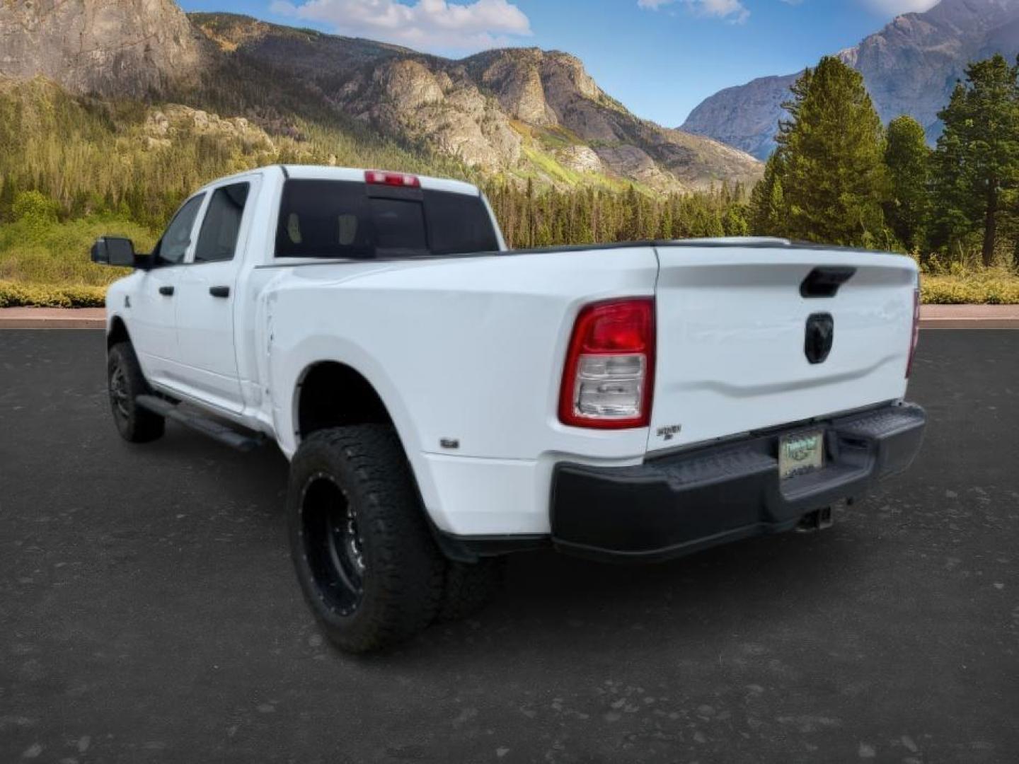 2020 WHITE /CLOTH Ram 3500 (3C63RRGL9LG) with an 67L engine, Automatic transmission, located at 1175 N Woodruff Ave, Idaho Falls, ID, 83401, 43.506901, -111.999657 - At Timberline Auto, finding a great deal on your next vehicle is always easy! Our experienced sales staff's goal is to help find you the right vehicle at the right price! Our knowledgeable finance department has options for almost any credit score. We offer extended service contract options to prote - Photo#2