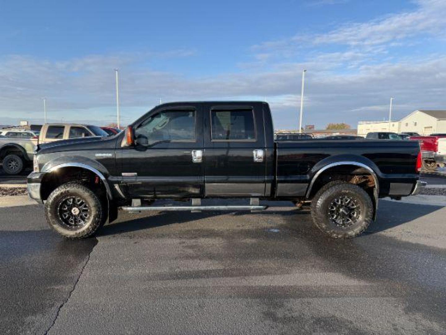 2005 BLACK /Medium Flint Ford F-350 (1FTWW31P15E) with an Powerstroke 6L V-8 diesel direct injection engine, Automatic transmission, located at 1175 N Woodruff Ave, Idaho Falls, ID, 83401, 43.506901, -111.999657 - At Timberline Auto, finding a great deal on your next vehicle is always easy! Our experienced sales staff's goal is to help find you the right vehicle at the right price! Our knowledgeable finance department has options for almost any credit score. We offer extended service contract options to prote - Photo#1