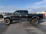 2005 BLACK /Medium Flint Ford F-350 (1FTWW31P15E) with an Powerstroke 6L V-8 diesel direct injection engine, Automatic transmission, located at 1175 N Woodruff Ave, Idaho Falls, ID, 83401, 43.506901, -111.999657 - At Timberline Auto, finding a great deal on your next vehicle is always easy! Our experienced sales staff's goal is to help find you the right vehicle at the right price! Our knowledgeable finance department has options for almost any credit score. We offer extended service contract options to prote - Photo#1