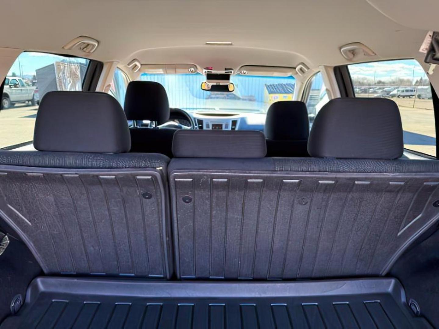 2014 MAROON /CLOTH Subaru Outback (4S4BRBCC5E3) with an 25L I4 engine, Automatic transmission, located at 1175 N Woodruff Ave, Idaho Falls, ID, 83401, 43.506901, -111.999657 - At Timberline Auto, finding a great deal on your next vehicle is always easy! Our experienced sales staff's goal is to help find you the right vehicle at the right price! Our knowledgeable finance department has options for almost any credit score. We offer extended service contract options to prote - Photo#5