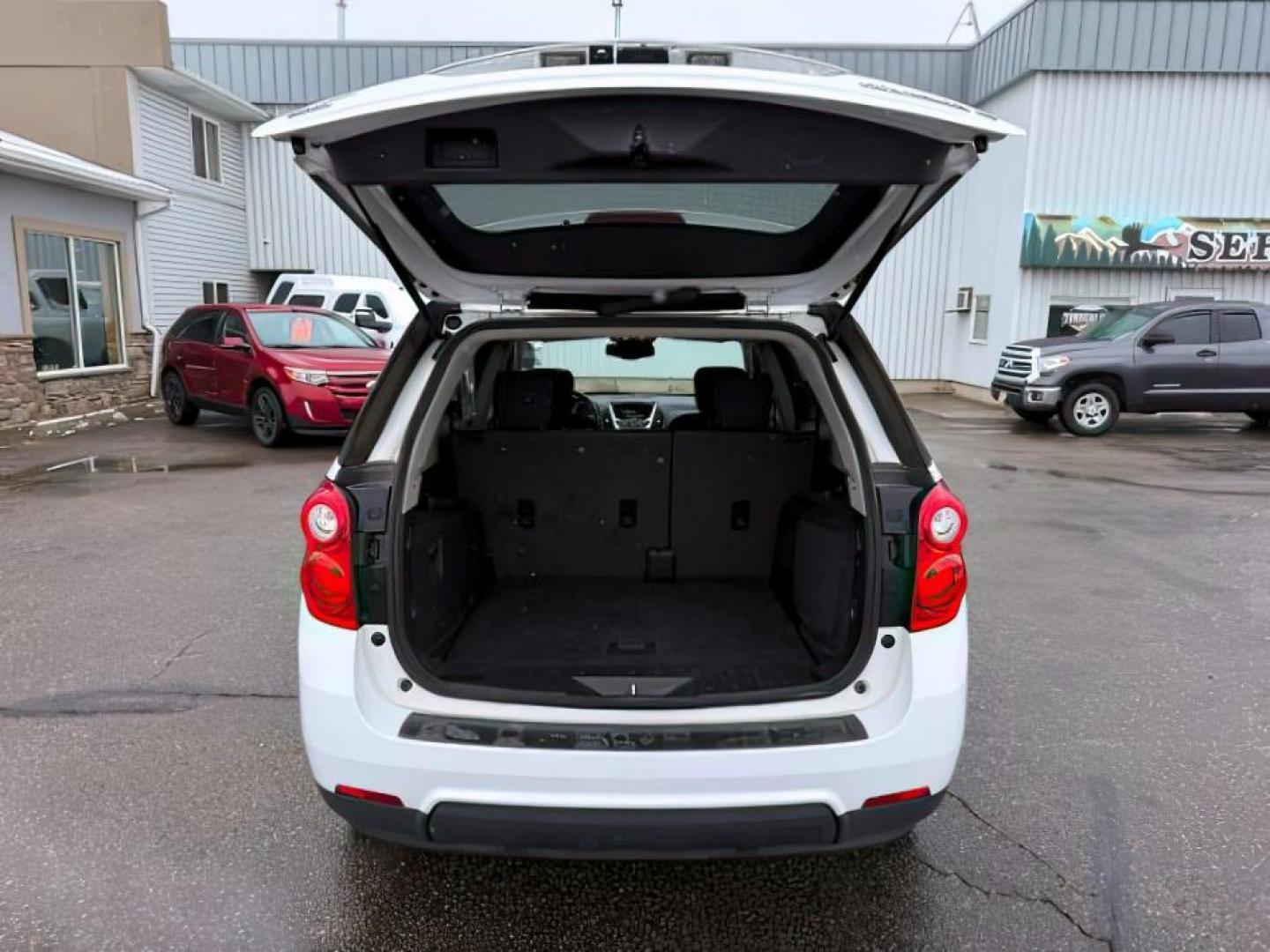 2015 WHITE /Jet Black Chevrolet Equinox (1GNFLGEK9FZ) with an ECOTEC 24L I-4 gasoline direct injection engine, Automatic transmission, located at 1175 N Woodruff Ave, Idaho Falls, ID, 83401, 43.506901, -111.999657 - At Timberline Auto, finding a great deal on your next vehicle is always easy! Our experienced sales staff's goal is to help find you the right vehicle at the right price! Our knowledgeable finance department has options for almost any credit score. We offer extended service contract options to prote - Photo#5