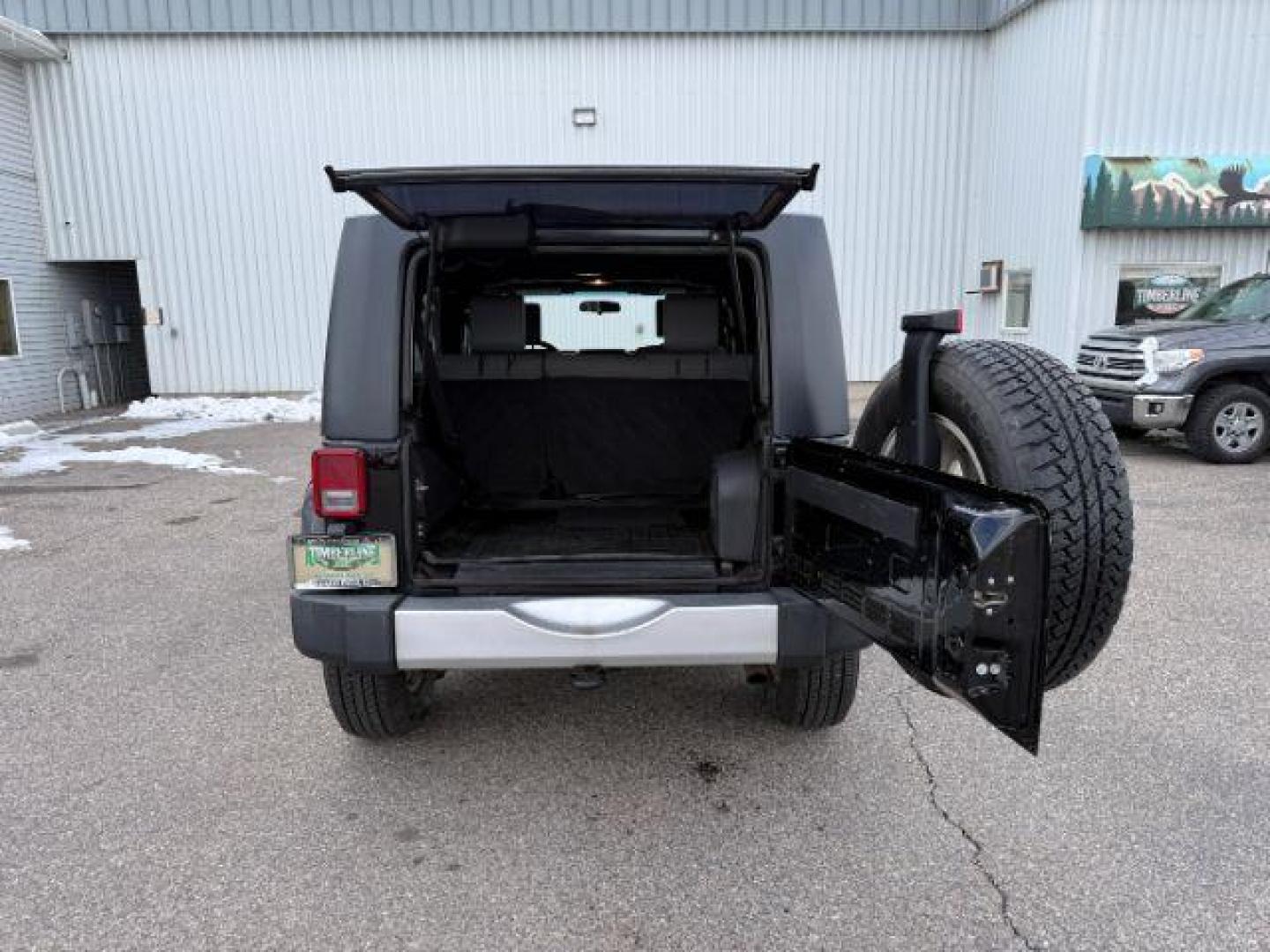 2008 BLACK /Dark Slate Gray/Med Slate Gray Jeep Wrangler (1J4GA59148L) with an 38L V-6 regular unleaded engine, Automatic transmission, located at 1175 N Woodruff Ave, Idaho Falls, ID, 83401, 43.506901, -111.999657 - At Timberline Auto, finding a great deal on your next vehicle is always easy! Our experienced sales staff's goal is to help find you the right vehicle at the right price! Our knowledgeable finance department has options for almost any credit score. We offer extended service contract options to prote - Photo#25