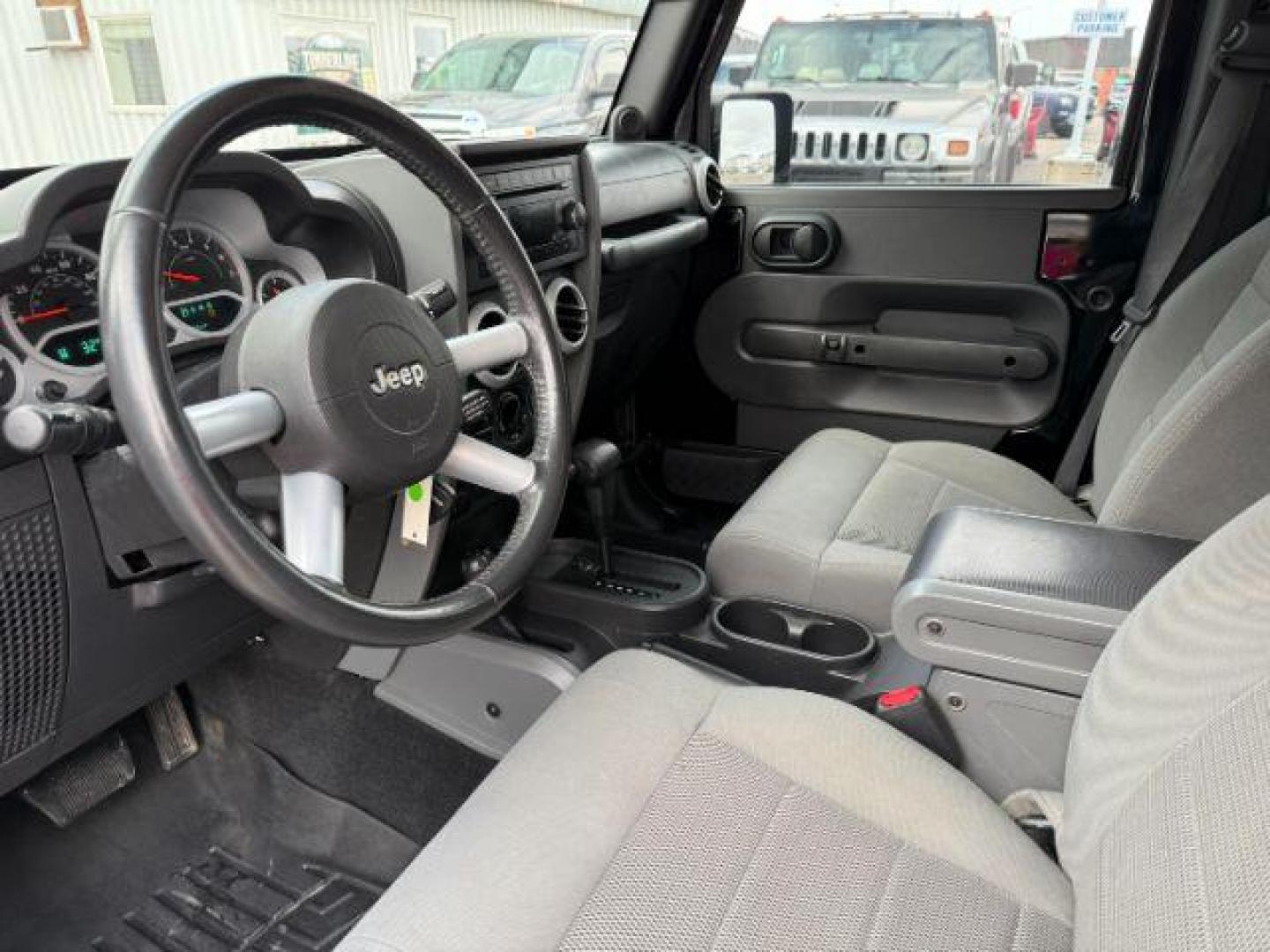 2008 BLACK /Dark Slate Gray/Med Slate Gray Jeep Wrangler (1J4GA59148L) with an 38L V-6 regular unleaded engine, Automatic transmission, located at 1175 N Woodruff Ave, Idaho Falls, ID, 83401, 43.506901, -111.999657 - At Timberline Auto, finding a great deal on your next vehicle is always easy! Our experienced sales staff's goal is to help find you the right vehicle at the right price! Our knowledgeable finance department has options for almost any credit score. We offer extended service contract options to prote - Photo#34