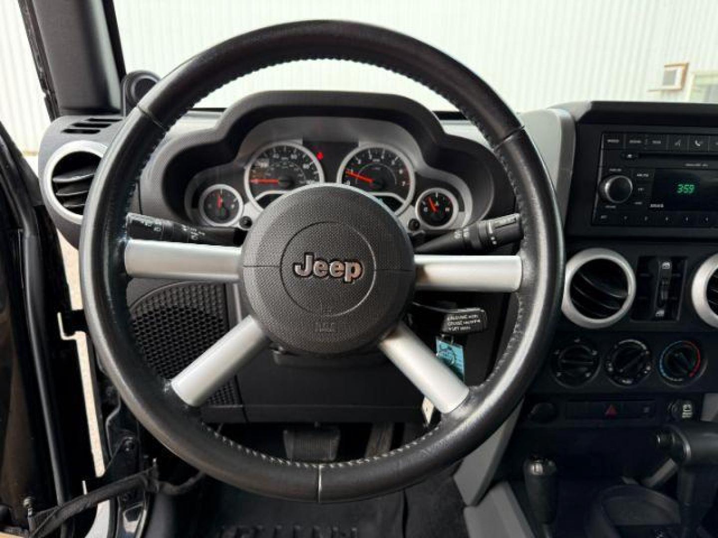 2008 BLACK /Dark Slate Gray/Med Slate Gray Jeep Wrangler (1J4GA59148L) with an 38L V-6 regular unleaded engine, Automatic transmission, located at 1175 N Woodruff Ave, Idaho Falls, ID, 83401, 43.506901, -111.999657 - At Timberline Auto, finding a great deal on your next vehicle is always easy! Our experienced sales staff's goal is to help find you the right vehicle at the right price! Our knowledgeable finance department has options for almost any credit score. We offer extended service contract options to prote - Photo#35