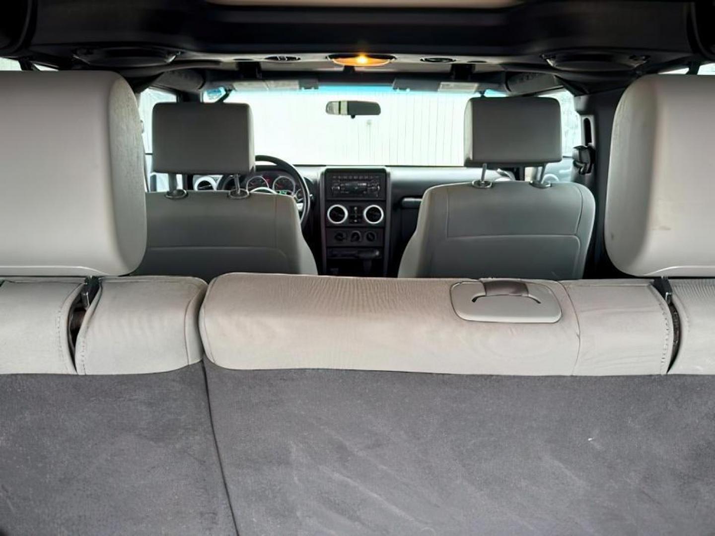 2008 BLACK /Dark Slate Gray/Med Slate Gray Jeep Wrangler (1J4GA59148L) with an 38L V-6 regular unleaded engine, Automatic transmission, located at 1175 N Woodruff Ave, Idaho Falls, ID, 83401, 43.506901, -111.999657 - At Timberline Auto, finding a great deal on your next vehicle is always easy! Our experienced sales staff's goal is to help find you the right vehicle at the right price! Our knowledgeable finance department has options for almost any credit score. We offer extended service contract options to prote - Photo#5