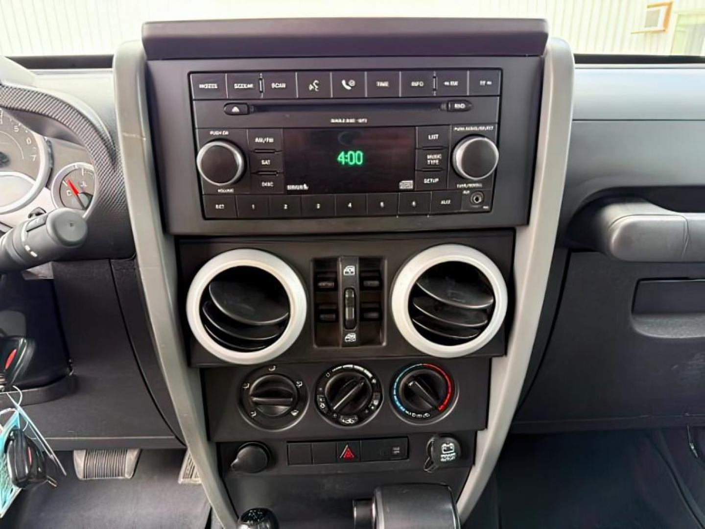 2008 BLACK /Dark Slate Gray/Med Slate Gray Jeep Wrangler (1J4GA59148L) with an 38L V-6 regular unleaded engine, Automatic transmission, located at 1175 N Woodruff Ave, Idaho Falls, ID, 83401, 43.506901, -111.999657 - At Timberline Auto, finding a great deal on your next vehicle is always easy! Our experienced sales staff's goal is to help find you the right vehicle at the right price! Our knowledgeable finance department has options for almost any credit score. We offer extended service contract options to prote - Photo#15