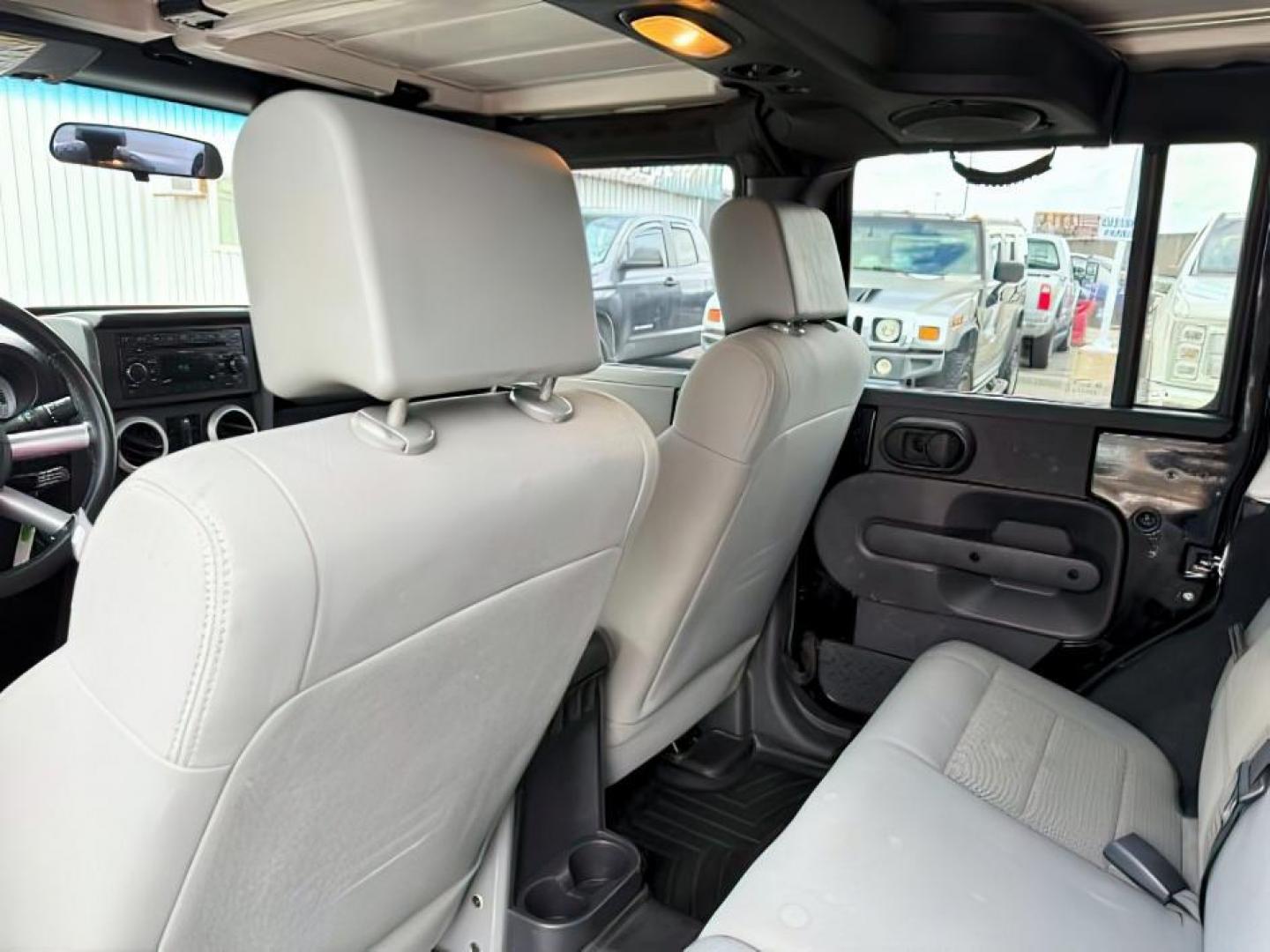 2008 BLACK /Dark Slate Gray/Med Slate Gray Jeep Wrangler (1J4GA59148L) with an 38L V-6 regular unleaded engine, Automatic transmission, located at 1175 N Woodruff Ave, Idaho Falls, ID, 83401, 43.506901, -111.999657 - At Timberline Auto, finding a great deal on your next vehicle is always easy! Our experienced sales staff's goal is to help find you the right vehicle at the right price! Our knowledgeable finance department has options for almost any credit score. We offer extended service contract options to prote - Photo#19