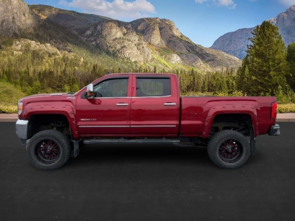 2018 RED /Jet Black GMC Sierra 3500HD SLT (1GT42XCY4JF) with an Duramax 6.6L V-8 diesel direct injection engine, AUTOMATIC transmission, located at 1235 N Woodruff Ave., Idaho Falls, 83401, (208) 523-1053, 43.507172, -112.000488 - At Timberline Auto, finding a great deal on your next vehicle is always easy! Our experienced sales staff's goal is to help find you the right vehicle at the right price! Our knowledgeable finance department has options for almost any credit score. We offer extended service contract options to prote - Photo#0