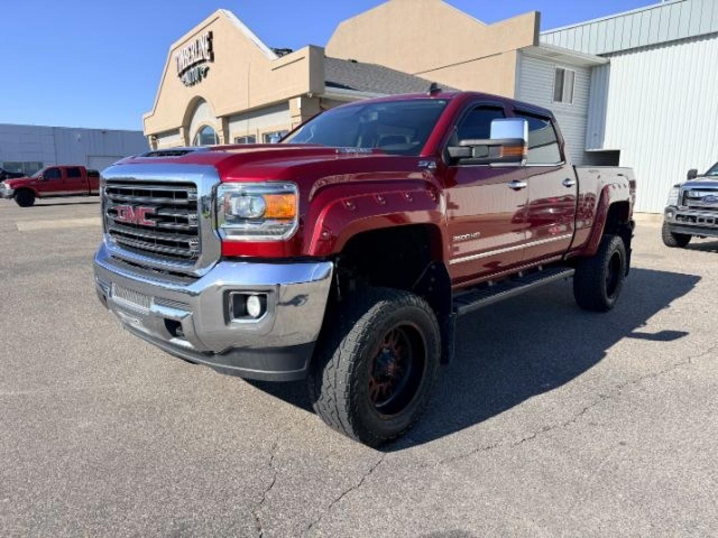 2018 RED /Jet Black GMC Sierra 3500HD (1GT42XCY4JF) with an Duramax 66L V-8 diesel direct injection engine, Automatic transmission, located at 1175 N Woodruff Ave, Idaho Falls, ID, 83401, 43.506901, -111.999657 - Heavy duty diesel strength and modern everyday convenience come together in this 2018 GMC Sierra 3500HD Crew Cab 4x4 equipped with the 6.6L Duramax turbo diesel engine. Built for serious towing and hauling, this 3500HD delivers the capability needed for trailers, equipment, and demanding workloads w- Photo#28