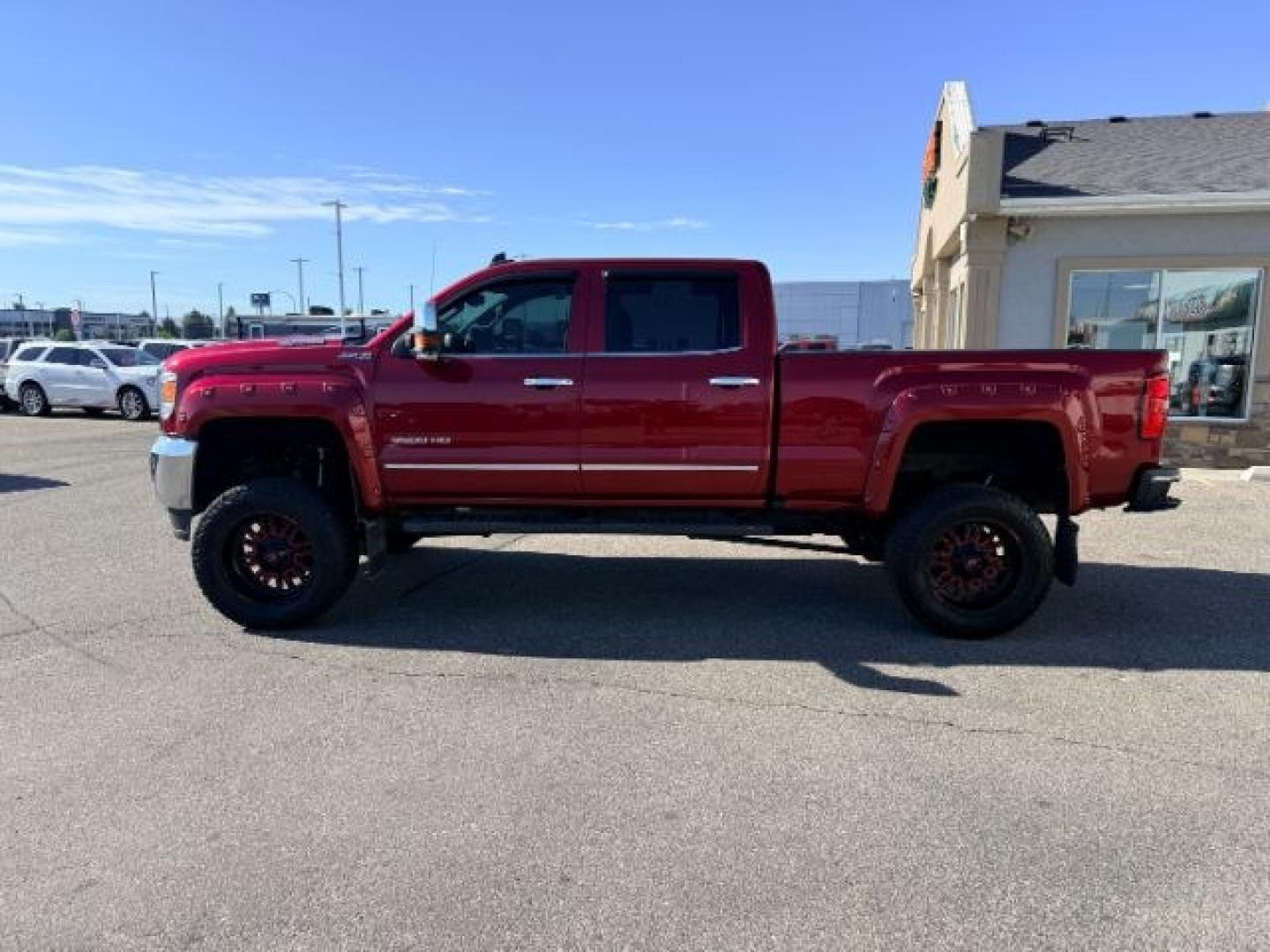 2018 RED /Jet Black GMC Sierra 3500HD (1GT42XCY4JF) with an Duramax 66L V-8 diesel direct injection engine, Automatic transmission, located at 1175 N Woodruff Ave, Idaho Falls, ID, 83401, 43.506901, -111.999657 - Heavy duty diesel strength and modern everyday convenience come together in this 2018 GMC Sierra 3500HD Crew Cab 4x4 equipped with the 6.6L Duramax turbo diesel engine. Built for serious towing and hauling, this 3500HD delivers the capability needed for trailers, equipment, and demanding workloads w- Photo#29