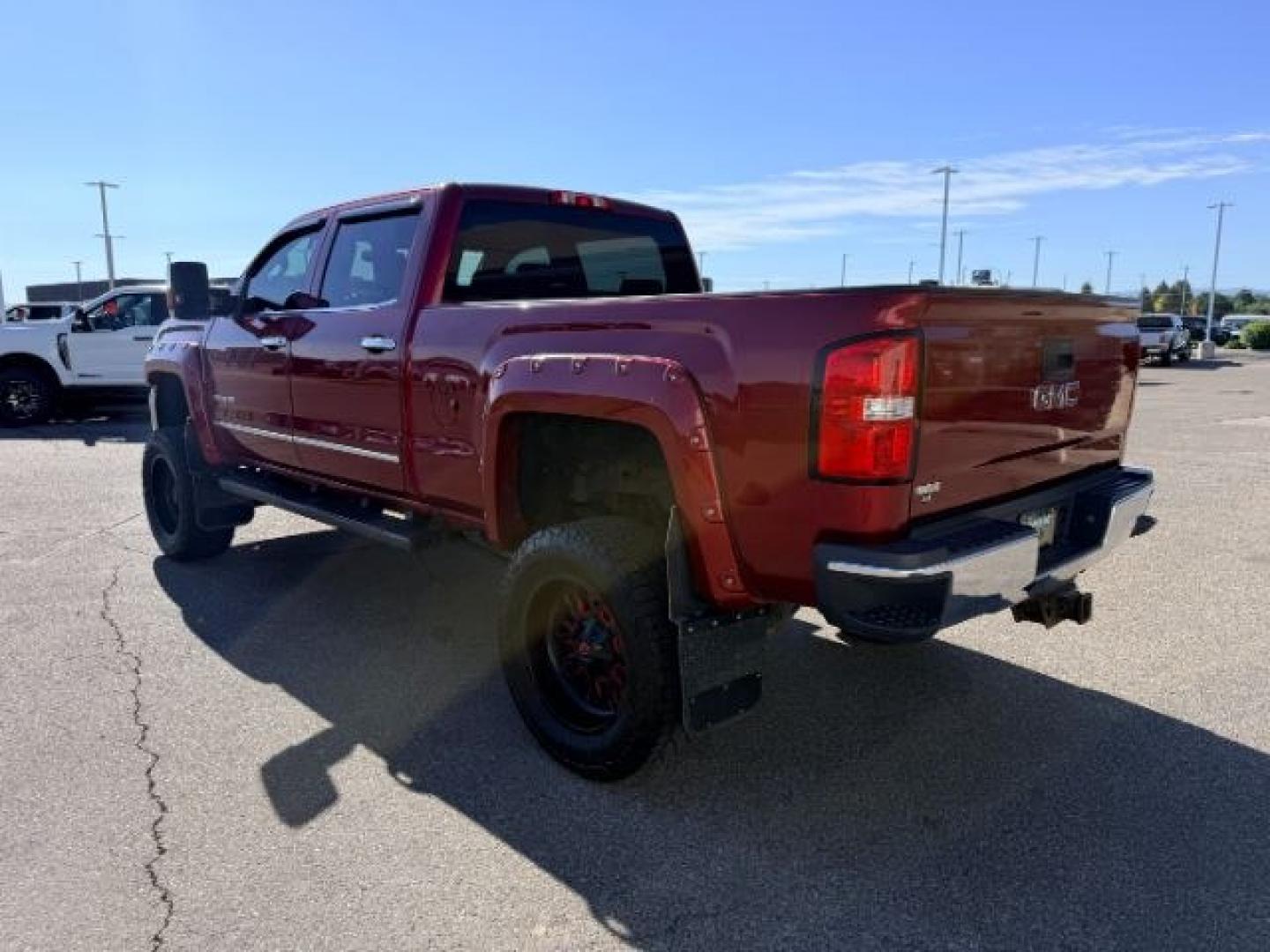 2018 RED /Jet Black GMC Sierra 3500HD (1GT42XCY4JF) with an Duramax 66L V-8 diesel direct injection engine, Automatic transmission, located at 1175 N Woodruff Ave, Idaho Falls, ID, 83401, 43.506901, -111.999657 - Heavy duty diesel strength and modern everyday convenience come together in this 2018 GMC Sierra 3500HD Crew Cab 4x4 equipped with the 6.6L Duramax turbo diesel engine. Built for serious towing and hauling, this 3500HD delivers the capability needed for trailers, equipment, and demanding workloads w- Photo#30