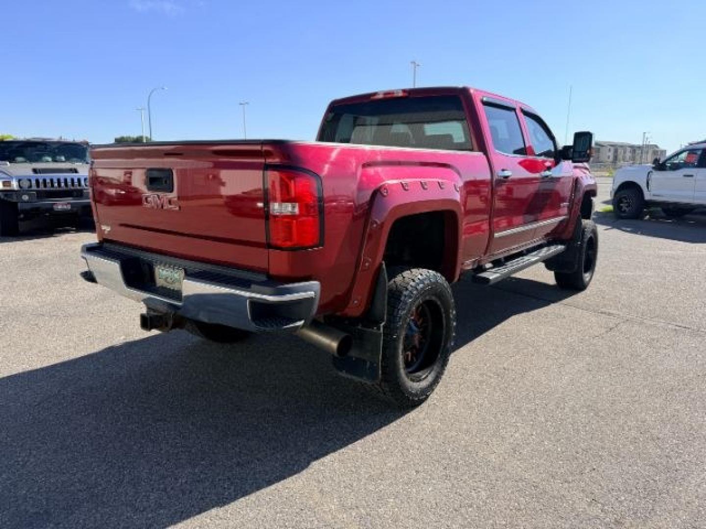 2018 RED /Jet Black GMC Sierra 3500HD (1GT42XCY4JF) with an Duramax 66L V-8 diesel direct injection engine, Automatic transmission, located at 1175 N Woodruff Ave, Idaho Falls, ID, 83401, 43.506901, -111.999657 - Heavy duty diesel strength and modern everyday convenience come together in this 2018 GMC Sierra 3500HD Crew Cab 4x4 equipped with the 6.6L Duramax turbo diesel engine. Built for serious towing and hauling, this 3500HD delivers the capability needed for trailers, equipment, and demanding workloads w- Photo#34
