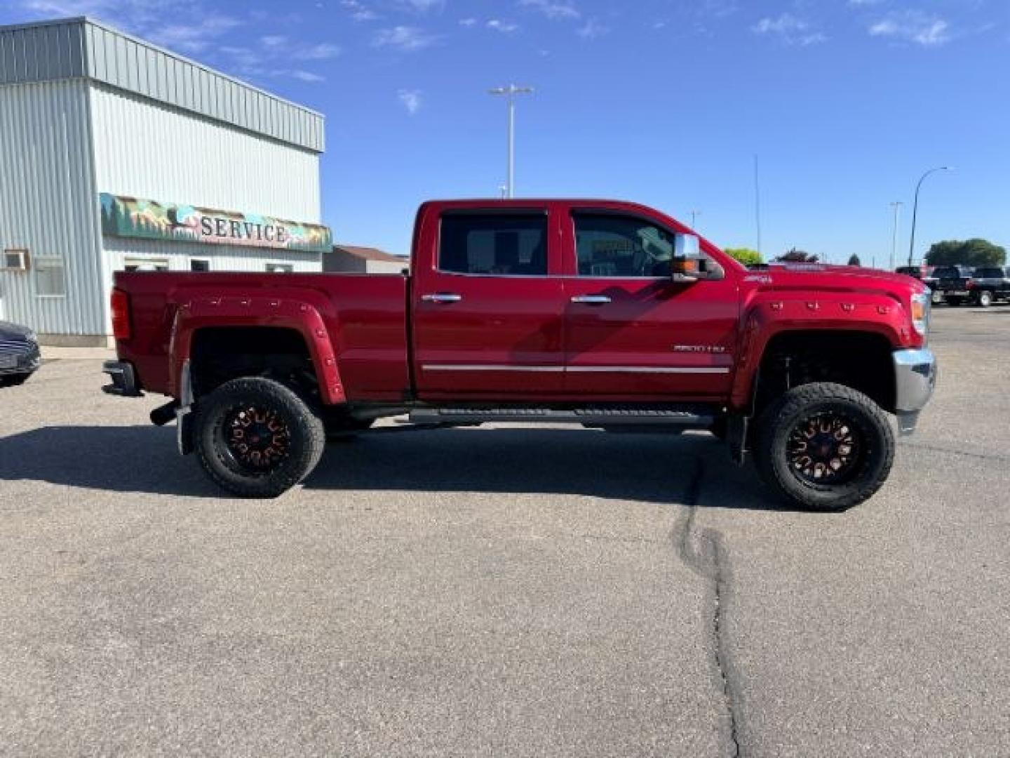 2018 RED /Jet Black GMC Sierra 3500HD (1GT42XCY4JF) with an Duramax 66L V-8 diesel direct injection engine, Automatic transmission, located at 1175 N Woodruff Ave, Idaho Falls, ID, 83401, 43.506901, -111.999657 - Heavy duty diesel strength and modern everyday convenience come together in this 2018 GMC Sierra 3500HD Crew Cab 4x4 equipped with the 6.6L Duramax turbo diesel engine. Built for serious towing and hauling, this 3500HD delivers the capability needed for trailers, equipment, and demanding workloads w- Photo#35