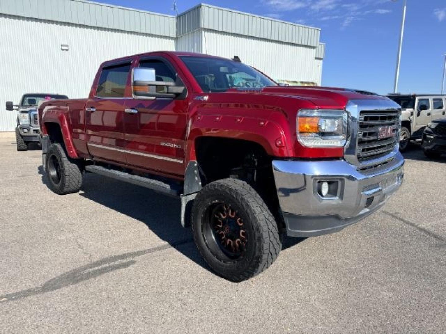 2018 RED /Jet Black GMC Sierra 3500HD (1GT42XCY4JF) with an Duramax 66L V-8 diesel direct injection engine, Automatic transmission, located at 1175 N Woodruff Ave, Idaho Falls, ID, 83401, 43.506901, -111.999657 - Heavy duty diesel strength and modern everyday convenience come together in this 2018 GMC Sierra 3500HD Crew Cab 4x4 equipped with the 6.6L Duramax turbo diesel engine. Built for serious towing and hauling, this 3500HD delivers the capability needed for trailers, equipment, and demanding workloads w- Photo#36