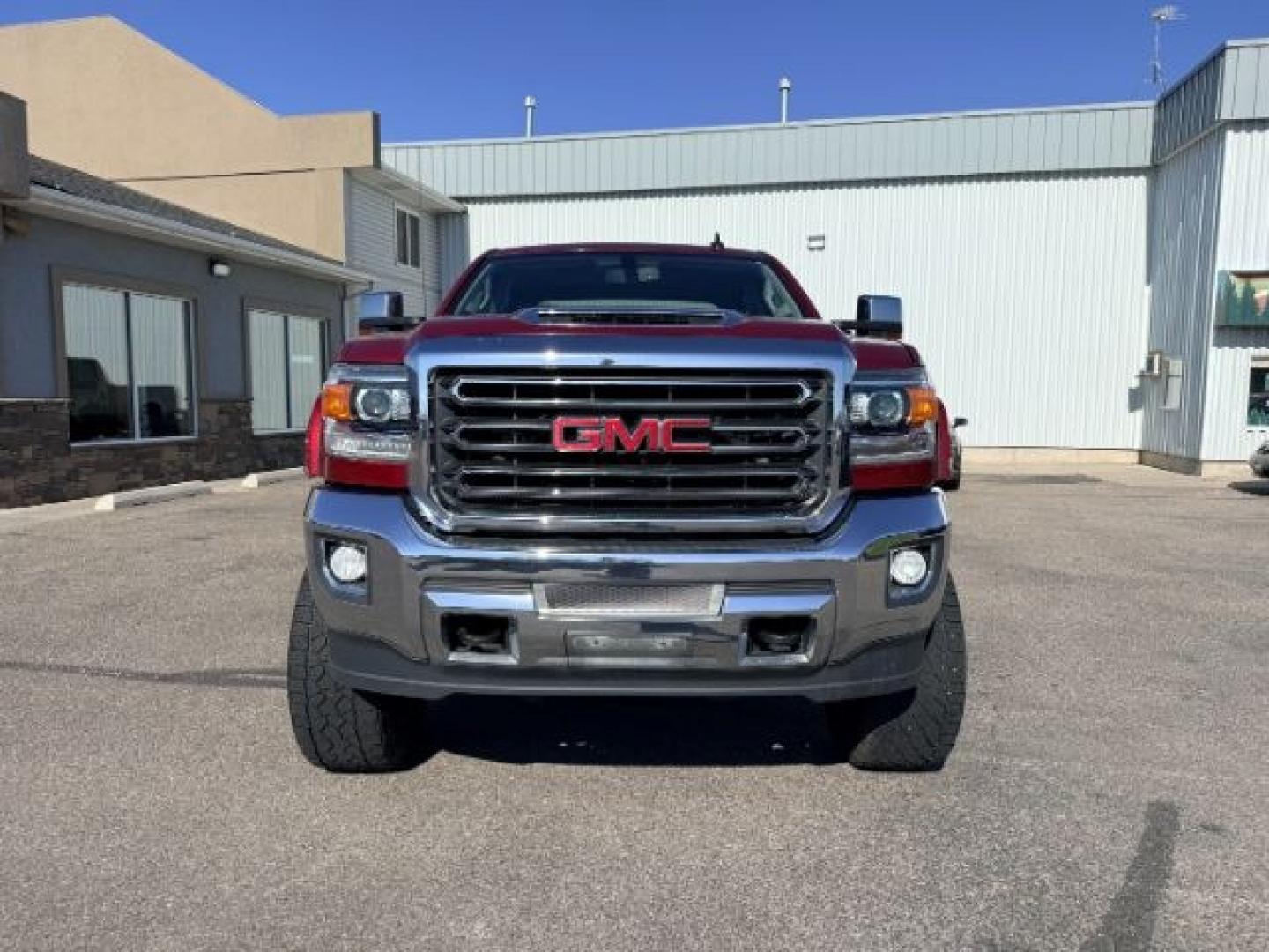 2018 RED /Jet Black GMC Sierra 3500HD (1GT42XCY4JF) with an Duramax 66L V-8 diesel direct injection engine, Automatic transmission, located at 1175 N Woodruff Ave, Idaho Falls, ID, 83401, 43.506901, -111.999657 - Heavy duty diesel strength and modern everyday convenience come together in this 2018 GMC Sierra 3500HD Crew Cab 4x4 equipped with the 6.6L Duramax turbo diesel engine. Built for serious towing and hauling, this 3500HD delivers the capability needed for trailers, equipment, and demanding workloads w- Photo#37