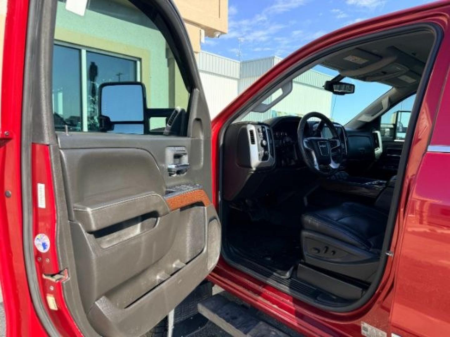2018 RED /Jet Black GMC Sierra 3500HD (1GT42XCY4JF) with an Duramax 66L V-8 diesel direct injection engine, Automatic transmission, located at 1175 N Woodruff Ave, Idaho Falls, ID, 83401, 43.506901, -111.999657 - Heavy duty diesel strength and modern everyday convenience come together in this 2018 GMC Sierra 3500HD Crew Cab 4x4 equipped with the 6.6L Duramax turbo diesel engine. Built for serious towing and hauling, this 3500HD delivers the capability needed for trailers, equipment, and demanding workloads w- Photo#40