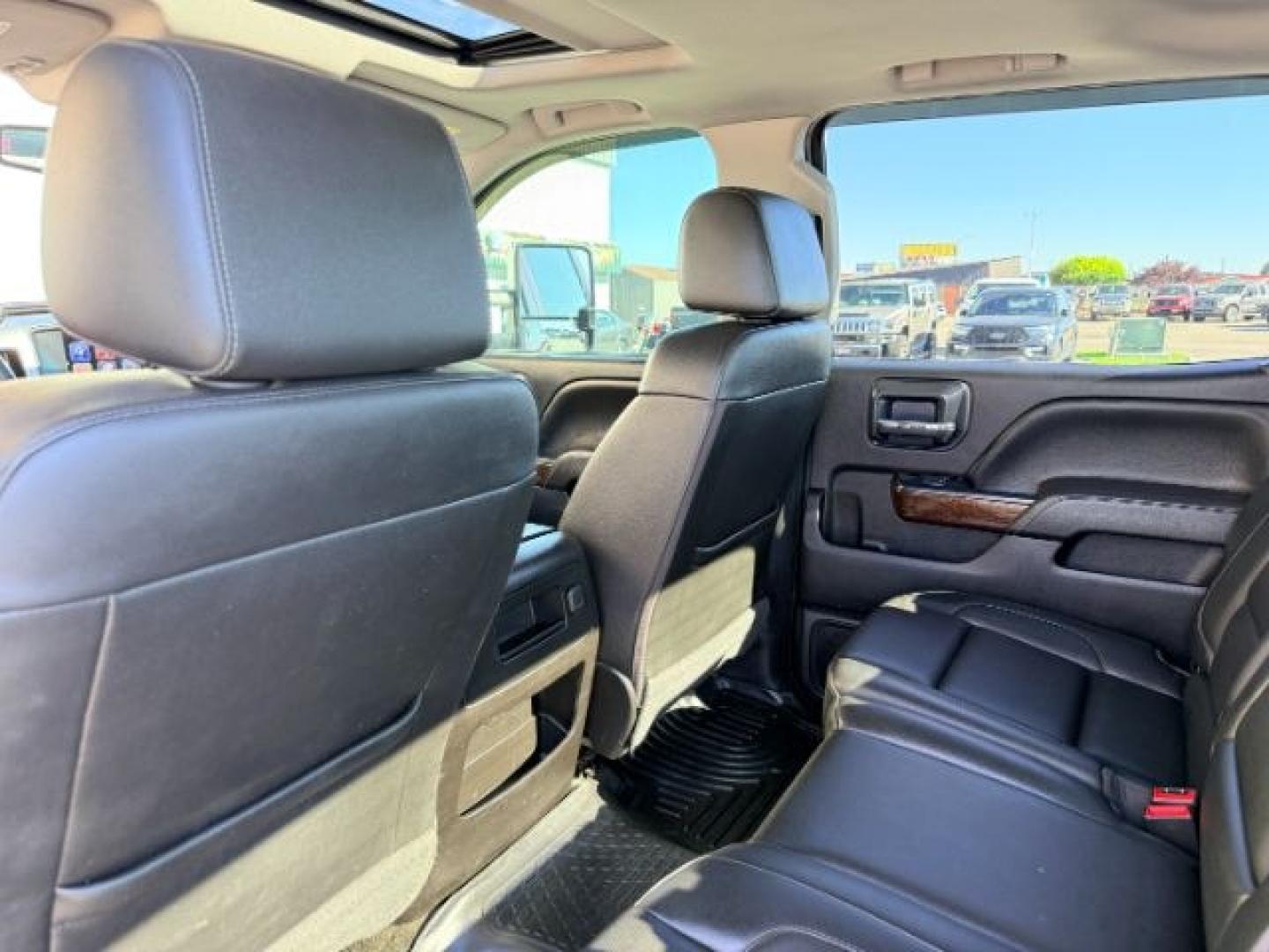 2018 RED /Jet Black GMC Sierra 3500HD (1GT42XCY4JF) with an Duramax 66L V-8 diesel direct injection engine, Automatic transmission, located at 1175 N Woodruff Ave, Idaho Falls, ID, 83401, 43.506901, -111.999657 - Heavy duty diesel strength and modern everyday convenience come together in this 2018 GMC Sierra 3500HD Crew Cab 4x4 equipped with the 6.6L Duramax turbo diesel engine. Built for serious towing and hauling, this 3500HD delivers the capability needed for trailers, equipment, and demanding workloads w- Photo#54