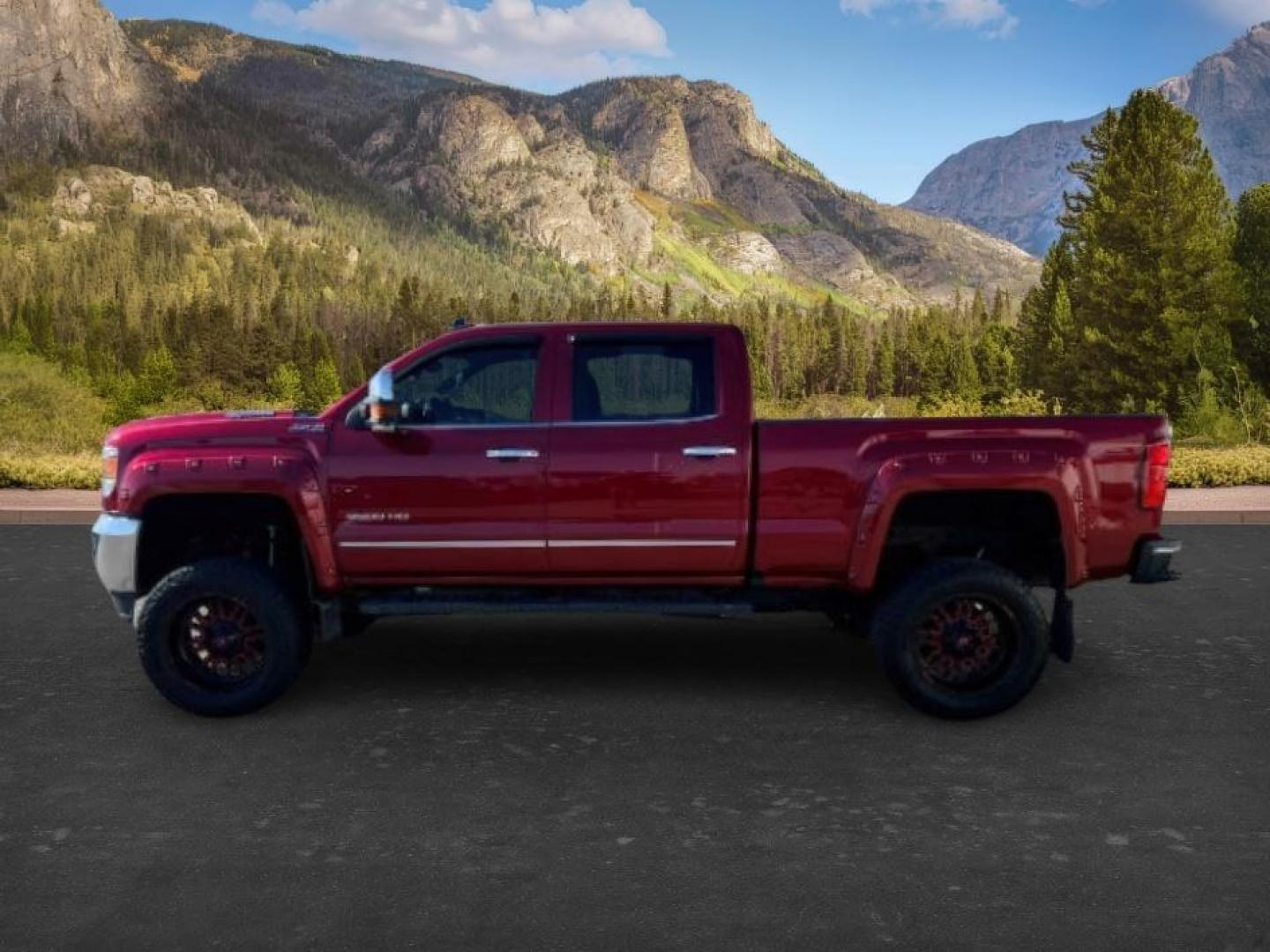 2018 RED /Jet Black GMC Sierra 3500HD (1GT42XCY4JF) with an Duramax 66L V-8 diesel direct injection engine, Automatic transmission, located at 1175 N Woodruff Ave, Idaho Falls, ID, 83401, 43.506901, -111.999657 - Heavy duty diesel strength and modern everyday convenience come together in this 2018 GMC Sierra 3500HD Crew Cab 4x4 equipped with the 6.6L Duramax turbo diesel engine. Built for serious towing and hauling, this 3500HD delivers the capability needed for trailers, equipment, and demanding workloads w- Photo#1