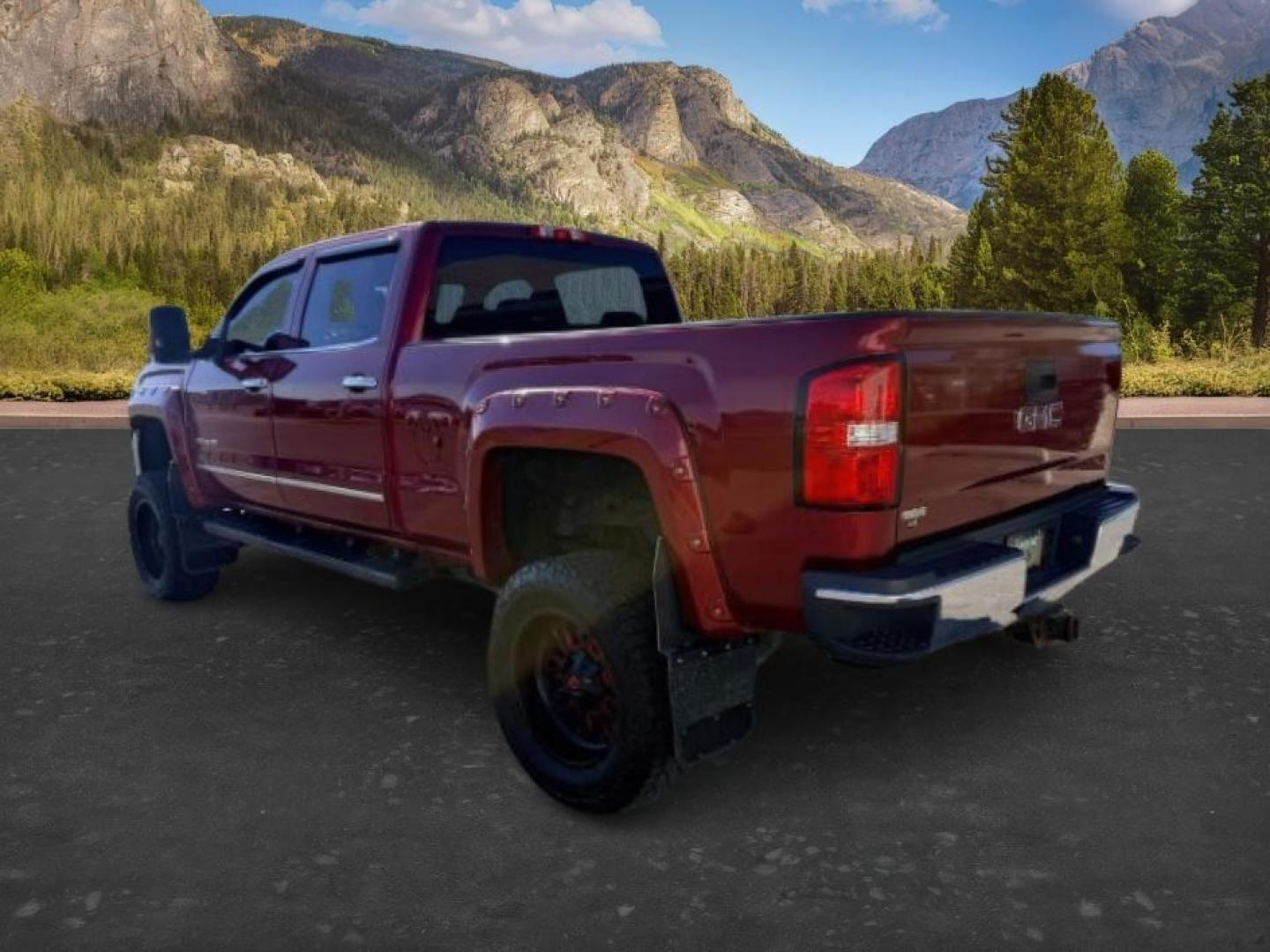 2018 RED /Jet Black GMC Sierra 3500HD (1GT42XCY4JF) with an Duramax 66L V-8 diesel direct injection engine, Automatic transmission, located at 1175 N Woodruff Ave, Idaho Falls, ID, 83401, 43.506901, -111.999657 - Heavy duty diesel strength and modern everyday convenience come together in this 2018 GMC Sierra 3500HD Crew Cab 4x4 equipped with the 6.6L Duramax turbo diesel engine. Built for serious towing and hauling, this 3500HD delivers the capability needed for trailers, equipment, and demanding workloads w- Photo#2