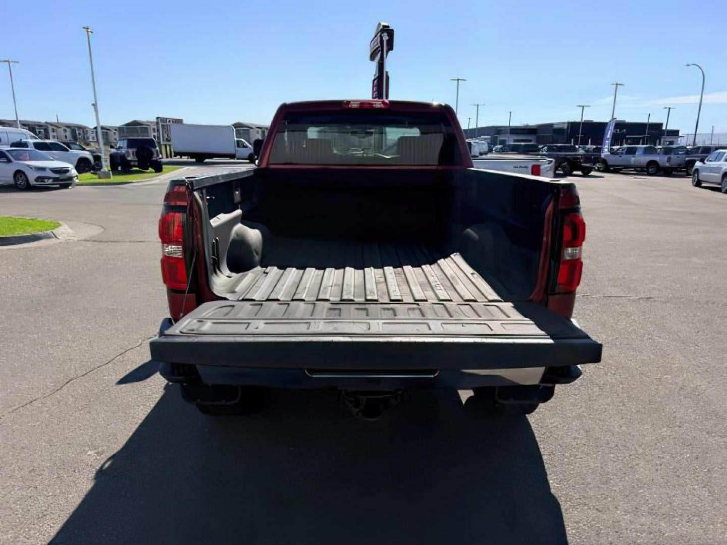 2018 RED /Jet Black GMC Sierra 3500HD (1GT42XCY4JF) with an Duramax 66L V-8 diesel direct injection engine, Automatic transmission, located at 1175 N Woodruff Ave, Idaho Falls, ID, 83401, 43.506901, -111.999657 - Heavy duty diesel strength and modern everyday convenience come together in this 2018 GMC Sierra 3500HD Crew Cab 4x4 equipped with the 6.6L Duramax turbo diesel engine. Built for serious towing and hauling, this 3500HD delivers the capability needed for trailers, equipment, and demanding workloads w- Photo#5