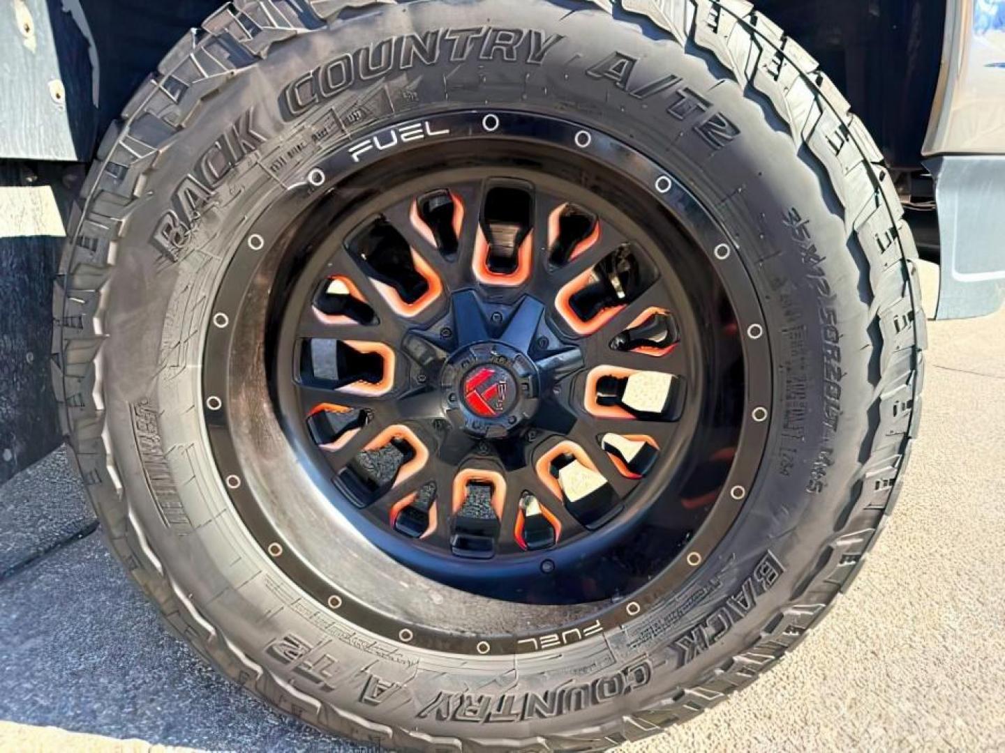 2018 RED /Jet Black GMC Sierra 3500HD (1GT42XCY4JF) with an Duramax 66L V-8 diesel direct injection engine, Automatic transmission, located at 1175 N Woodruff Ave, Idaho Falls, ID, 83401, 43.506901, -111.999657 - Heavy duty diesel strength and modern everyday convenience come together in this 2018 GMC Sierra 3500HD Crew Cab 4x4 equipped with the 6.6L Duramax turbo diesel engine. Built for serious towing and hauling, this 3500HD delivers the capability needed for trailers, equipment, and demanding workloads w- Photo#11