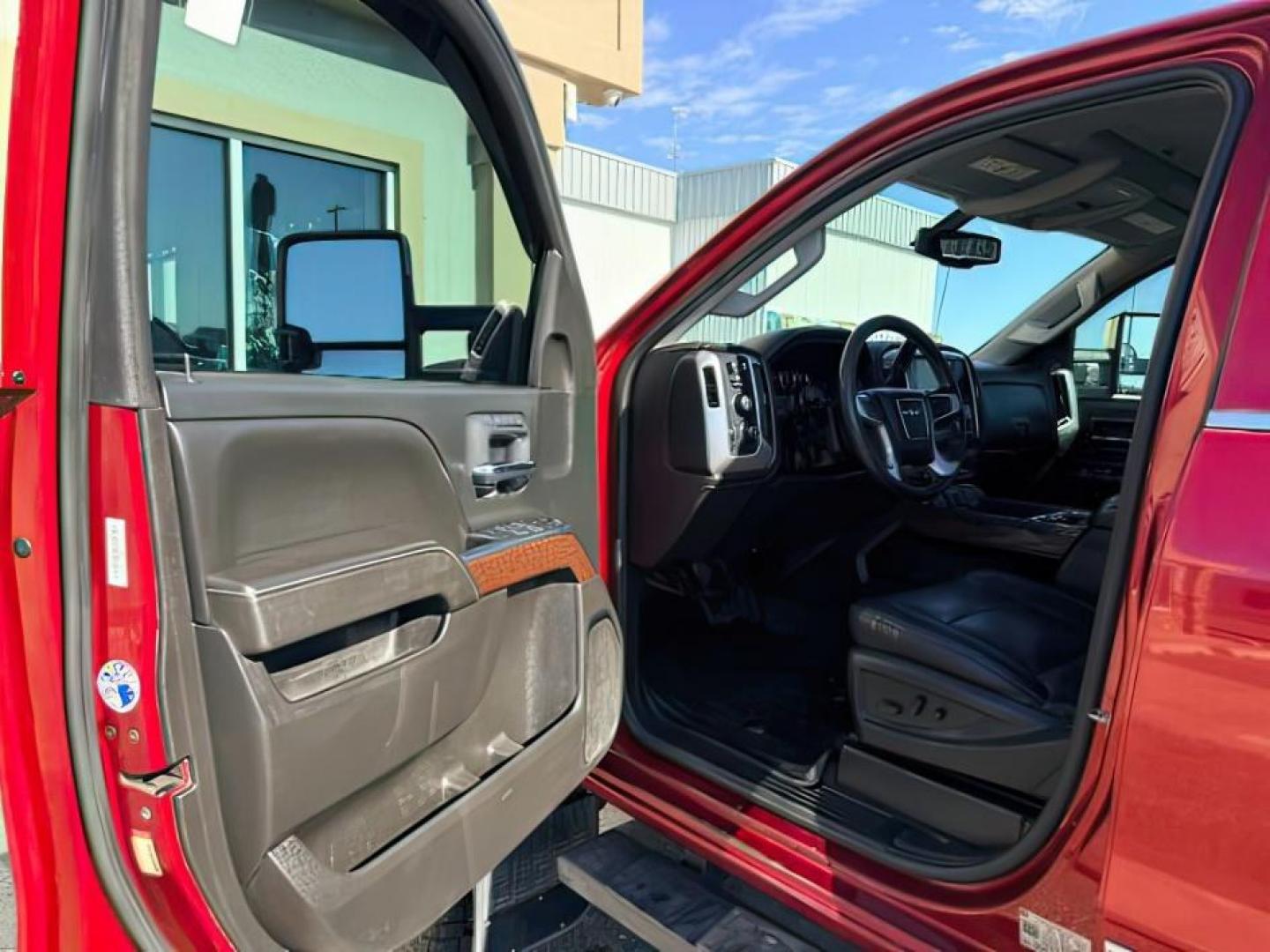 2018 RED /Jet Black GMC Sierra 3500HD (1GT42XCY4JF) with an Duramax 66L V-8 diesel direct injection engine, Automatic transmission, located at 1175 N Woodruff Ave, Idaho Falls, ID, 83401, 43.506901, -111.999657 - Heavy duty diesel strength and modern everyday convenience come together in this 2018 GMC Sierra 3500HD Crew Cab 4x4 equipped with the 6.6L Duramax turbo diesel engine. Built for serious towing and hauling, this 3500HD delivers the capability needed for trailers, equipment, and demanding workloads w- Photo#12