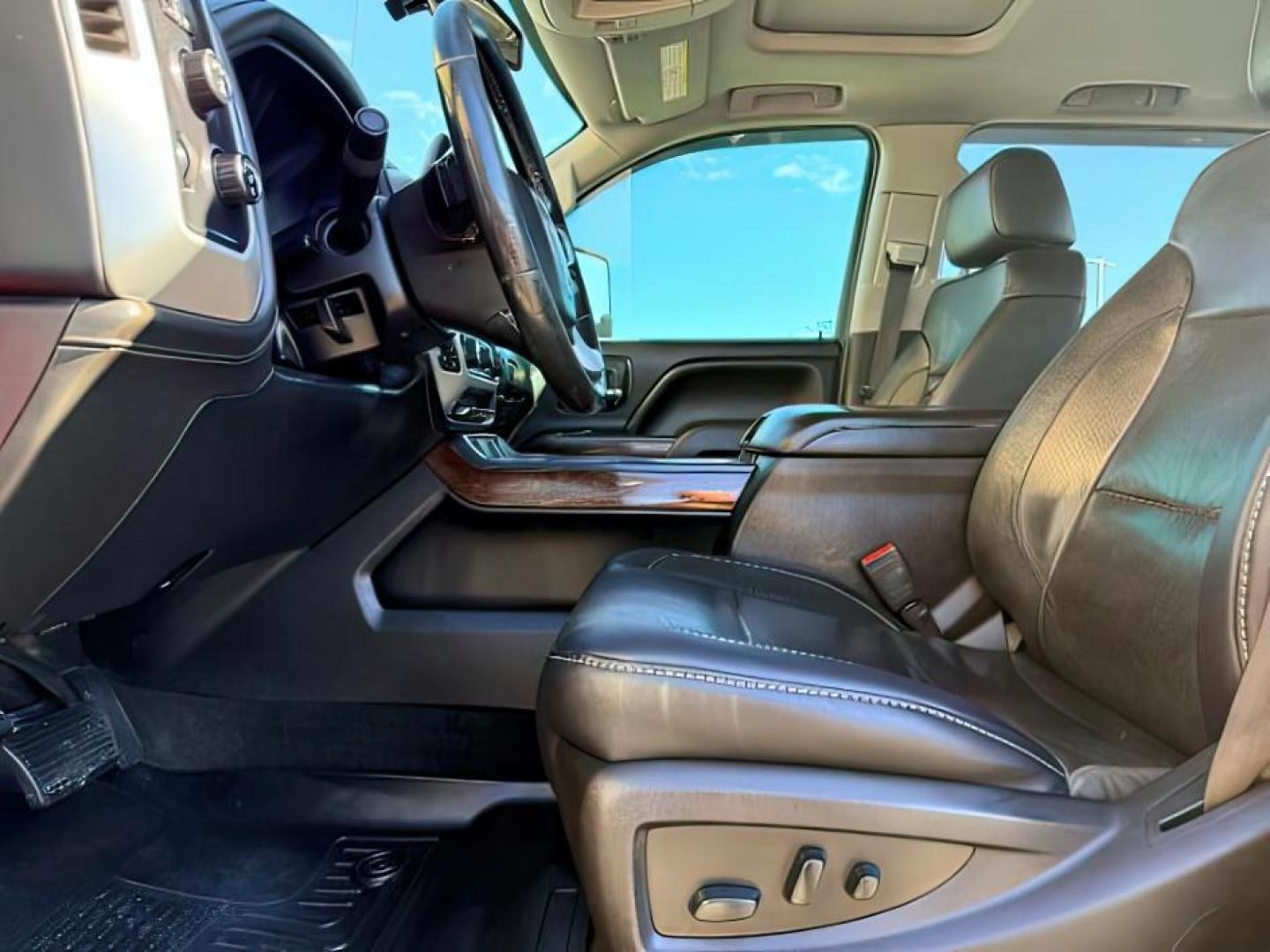 2018 RED /Jet Black GMC Sierra 3500HD (1GT42XCY4JF) with an Duramax 66L V-8 diesel direct injection engine, Automatic transmission, located at 1175 N Woodruff Ave, Idaho Falls, ID, 83401, 43.506901, -111.999657 - Heavy duty diesel strength and modern everyday convenience come together in this 2018 GMC Sierra 3500HD Crew Cab 4x4 equipped with the 6.6L Duramax turbo diesel engine. Built for serious towing and hauling, this 3500HD delivers the capability needed for trailers, equipment, and demanding workloads w- Photo#13