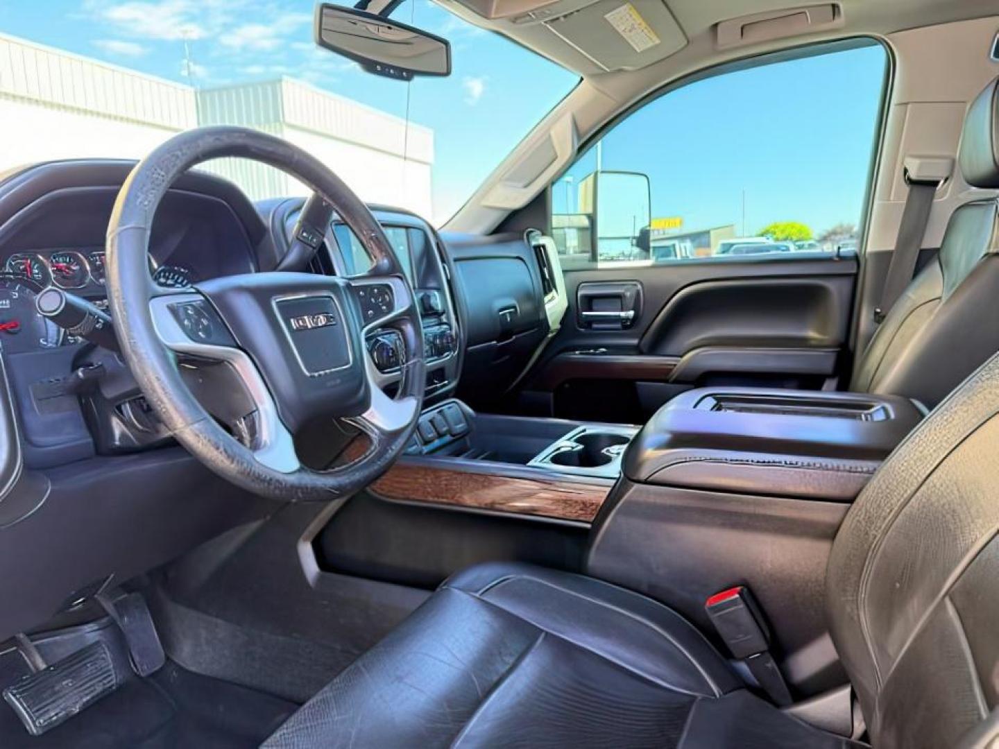2018 RED /Jet Black GMC Sierra 3500HD (1GT42XCY4JF) with an Duramax 66L V-8 diesel direct injection engine, Automatic transmission, located at 1175 N Woodruff Ave, Idaho Falls, ID, 83401, 43.506901, -111.999657 - Heavy duty diesel strength and modern everyday convenience come together in this 2018 GMC Sierra 3500HD Crew Cab 4x4 equipped with the 6.6L Duramax turbo diesel engine. Built for serious towing and hauling, this 3500HD delivers the capability needed for trailers, equipment, and demanding workloads w- Photo#14