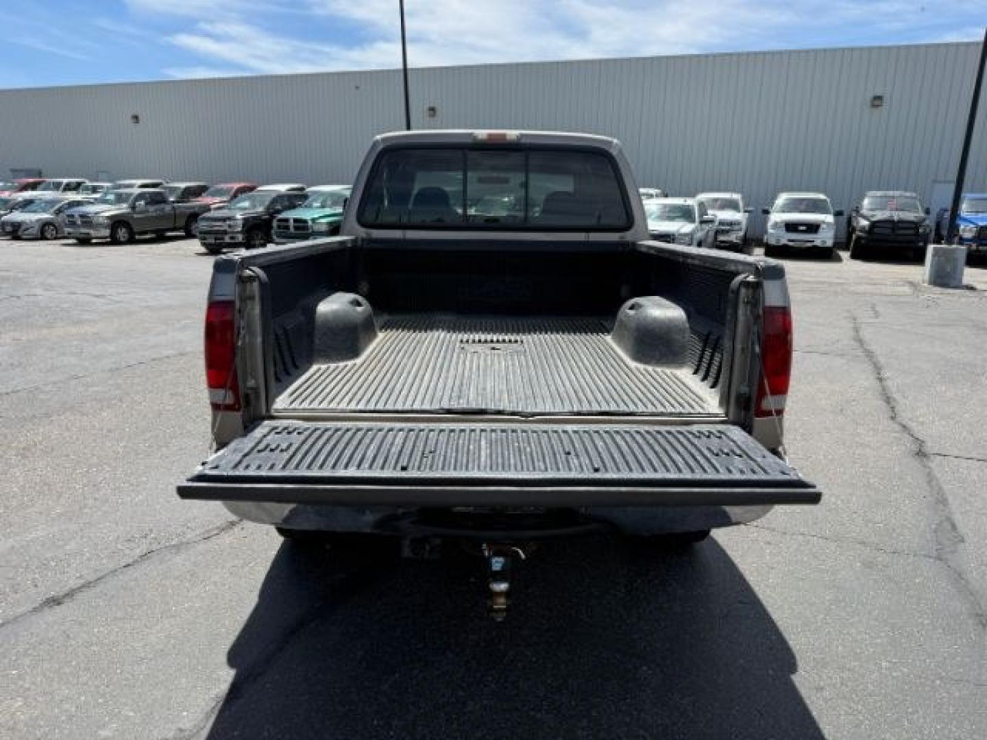 2002 BROWN /LEATHER Ford Super Duty F-250 (1FTNW21F02E) with an 73L V8 engine, Automatic transmission, located at 1175 N Woodruff Ave, Idaho Falls, ID, 83401, 43.506901, -111.999657 - This 2002 Ford F-250 Super Duty is a heavy-duty pickup built for serious work and strong diesel performance. Powered by the legendary 7.3L Power Stroke diesel, it delivers the low-end torque and hauling capability these trucks are known for. It comes lifted and sits on XD wheels, giving it an aggres- Photo#29