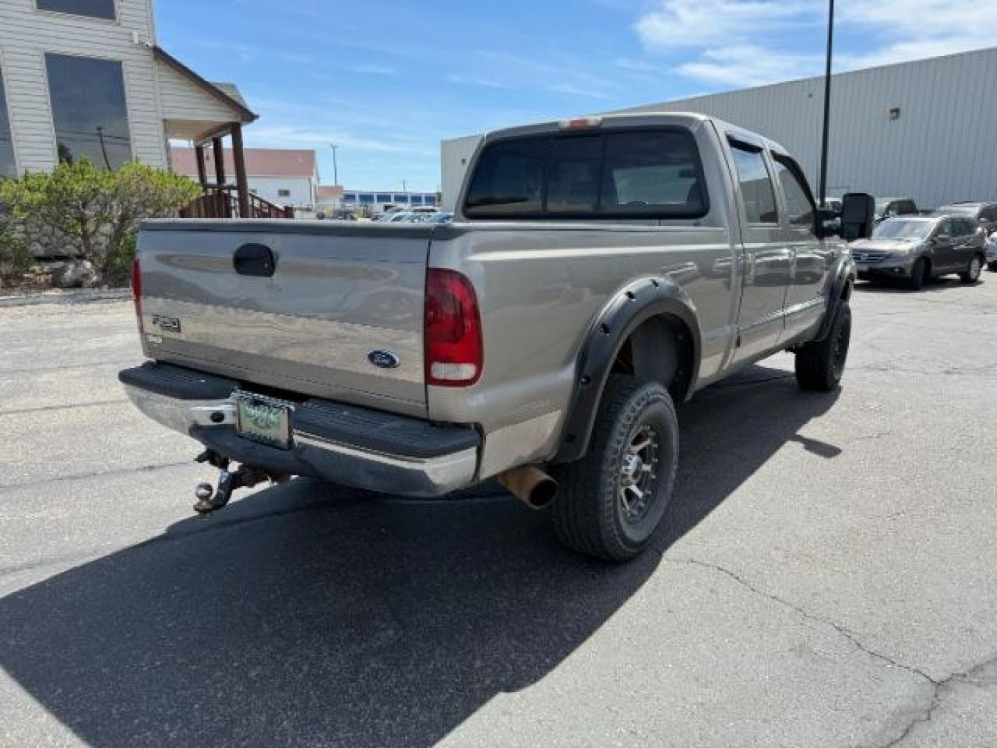 2002 BROWN /LEATHER Ford Super Duty F-250 (1FTNW21F02E) with an 73L V8 engine, Automatic transmission, located at 1175 N Woodruff Ave, Idaho Falls, ID, 83401, 43.506901, -111.999657 - This 2002 Ford F-250 Super Duty is a heavy-duty pickup built for serious work and strong diesel performance. Powered by the legendary 7.3L Power Stroke diesel, it delivers the low-end torque and hauling capability these trucks are known for. It comes lifted and sits on XD wheels, giving it an aggres- Photo#30