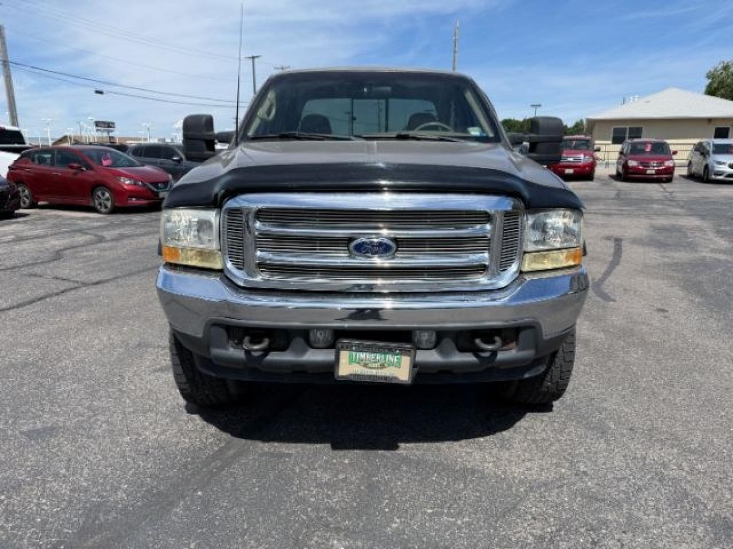 2002 BROWN /LEATHER Ford Super Duty F-250 (1FTNW21F02E) with an 73L V8 engine, Automatic transmission, located at 1175 N Woodruff Ave, Idaho Falls, ID, 83401, 43.506901, -111.999657 - This 2002 Ford F-250 Super Duty is a heavy-duty pickup built for serious work and strong diesel performance. Powered by the legendary 7.3L Power Stroke diesel, it delivers the low-end torque and hauling capability these trucks are known for. It comes lifted and sits on XD wheels, giving it an aggres- Photo#33