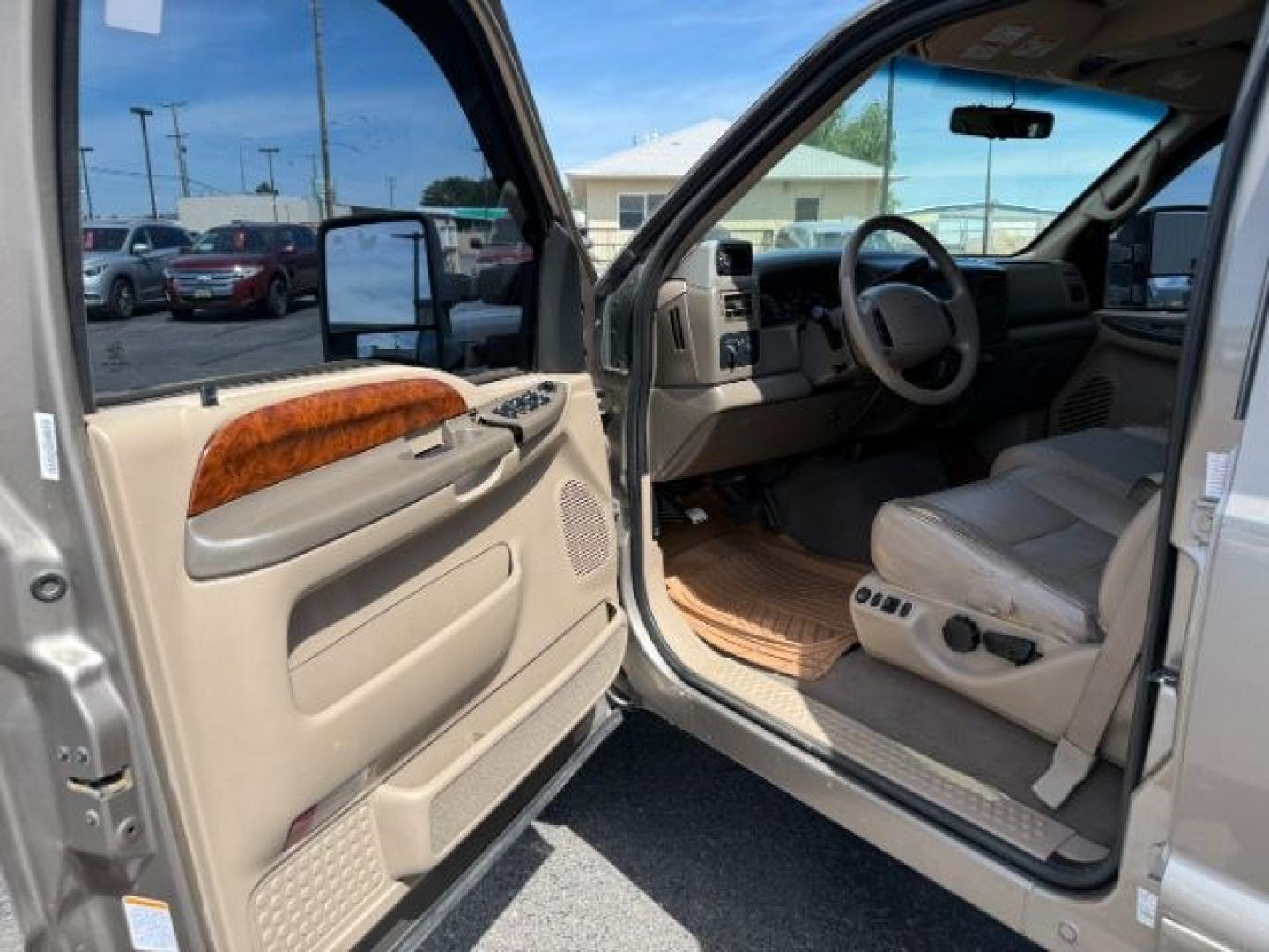 2002 BROWN /LEATHER Ford Super Duty F-250 (1FTNW21F02E) with an 73L V8 engine, Automatic transmission, located at 1175 N Woodruff Ave, Idaho Falls, ID, 83401, 43.506901, -111.999657 - This 2002 Ford F-250 Super Duty is a heavy-duty pickup built for serious work and strong diesel performance. Powered by the legendary 7.3L Power Stroke diesel, it delivers the low-end torque and hauling capability these trucks are known for. It comes lifted and sits on XD wheels, giving it an aggres- Photo#36