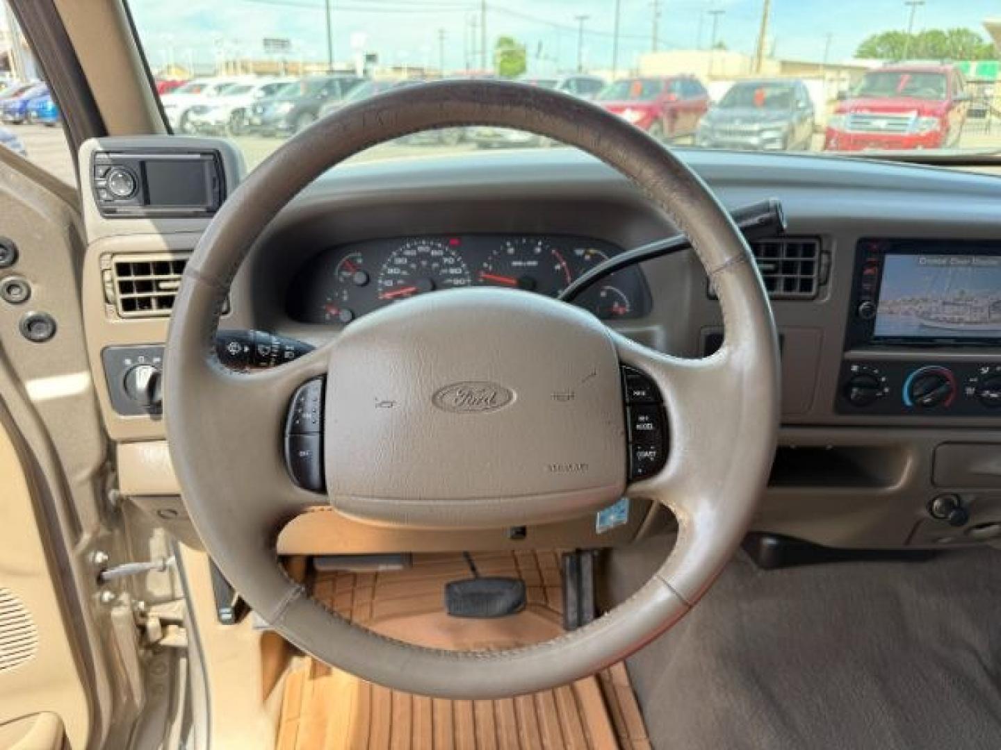 2002 BROWN /LEATHER Ford Super Duty F-250 (1FTNW21F02E) with an 73L V8 engine, Automatic transmission, located at 1175 N Woodruff Ave, Idaho Falls, ID, 83401, 43.506901, -111.999657 - This 2002 Ford F-250 Super Duty is a heavy-duty pickup built for serious work and strong diesel performance. Powered by the legendary 7.3L Power Stroke diesel, it delivers the low-end torque and hauling capability these trucks are known for. It comes lifted and sits on XD wheels, giving it an aggres- Photo#39